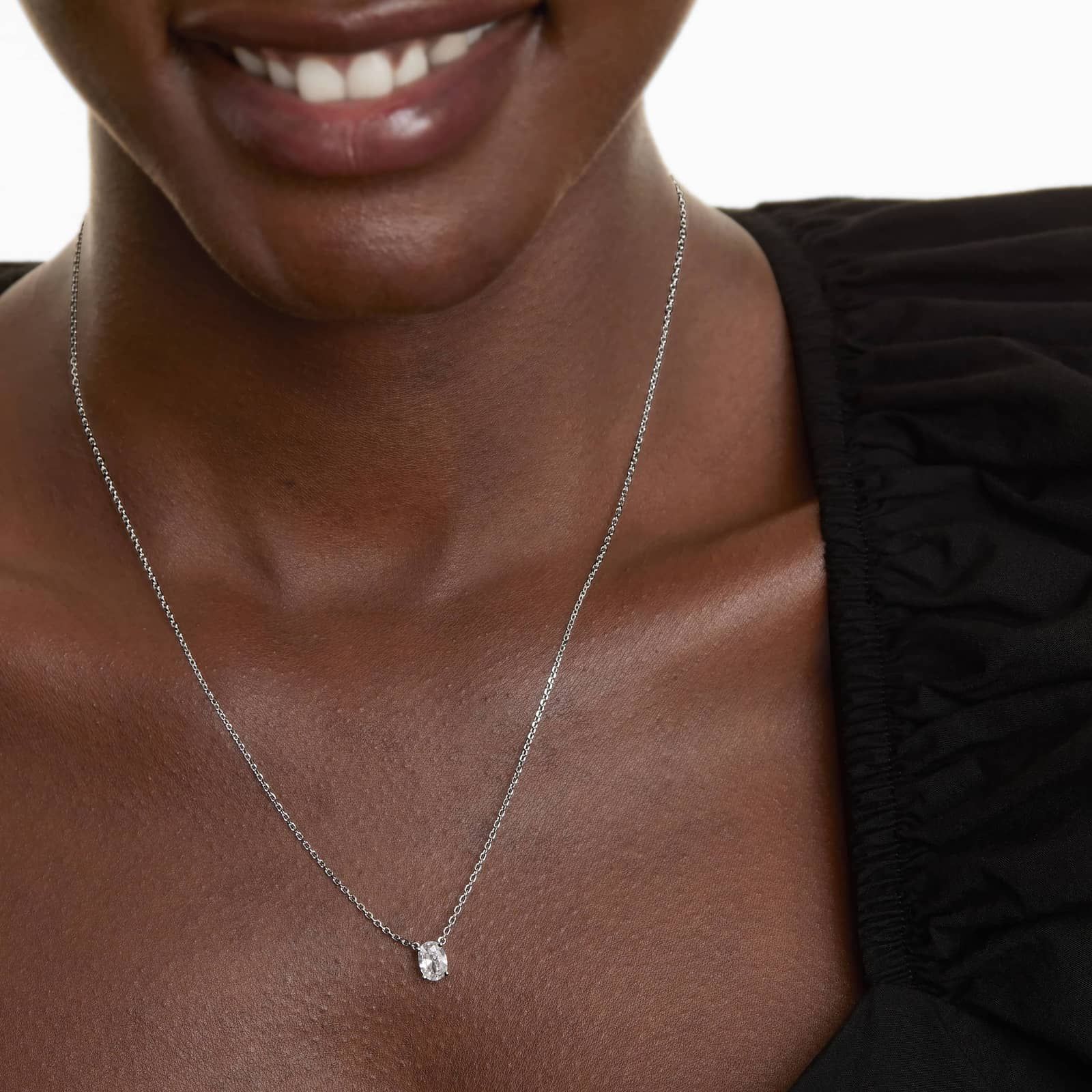 Platinum Oval Shape Diamond Solitaire Pendant (0.50 CTW - H-I / SI1-SI2)