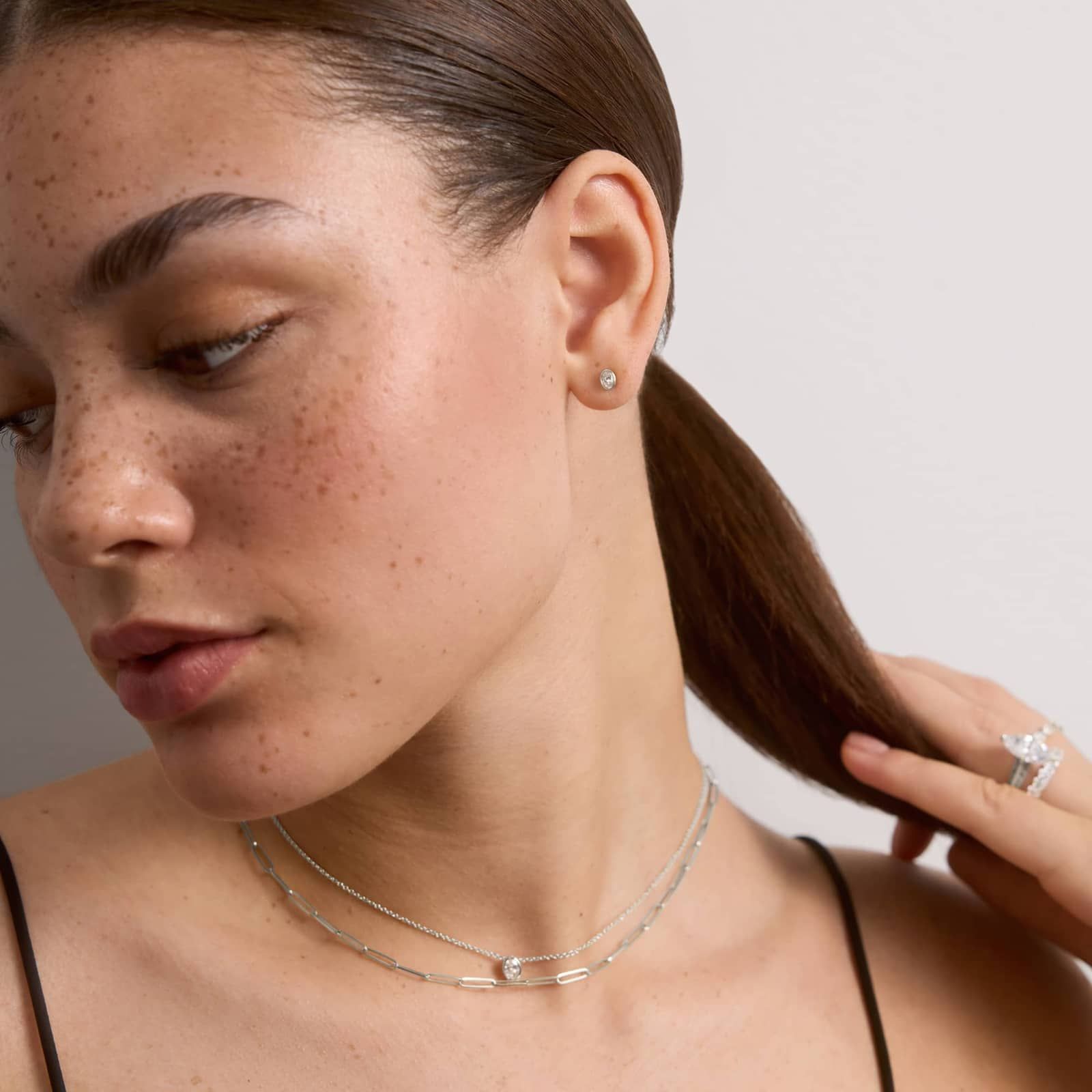 Bezel Stud Earrings With 0.25 CTW Oval Cut Lab-Grown Diamonds in 14K White Gold