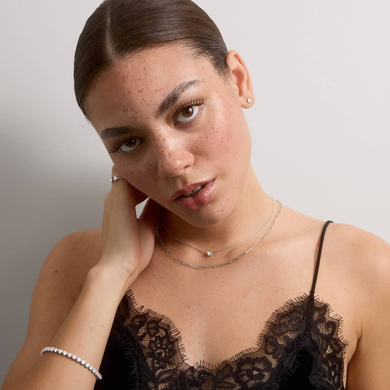 Bezel Stud Earrings With 0.25 CTW Oval Cut Lab-Grown Diamonds in 14K White Gold