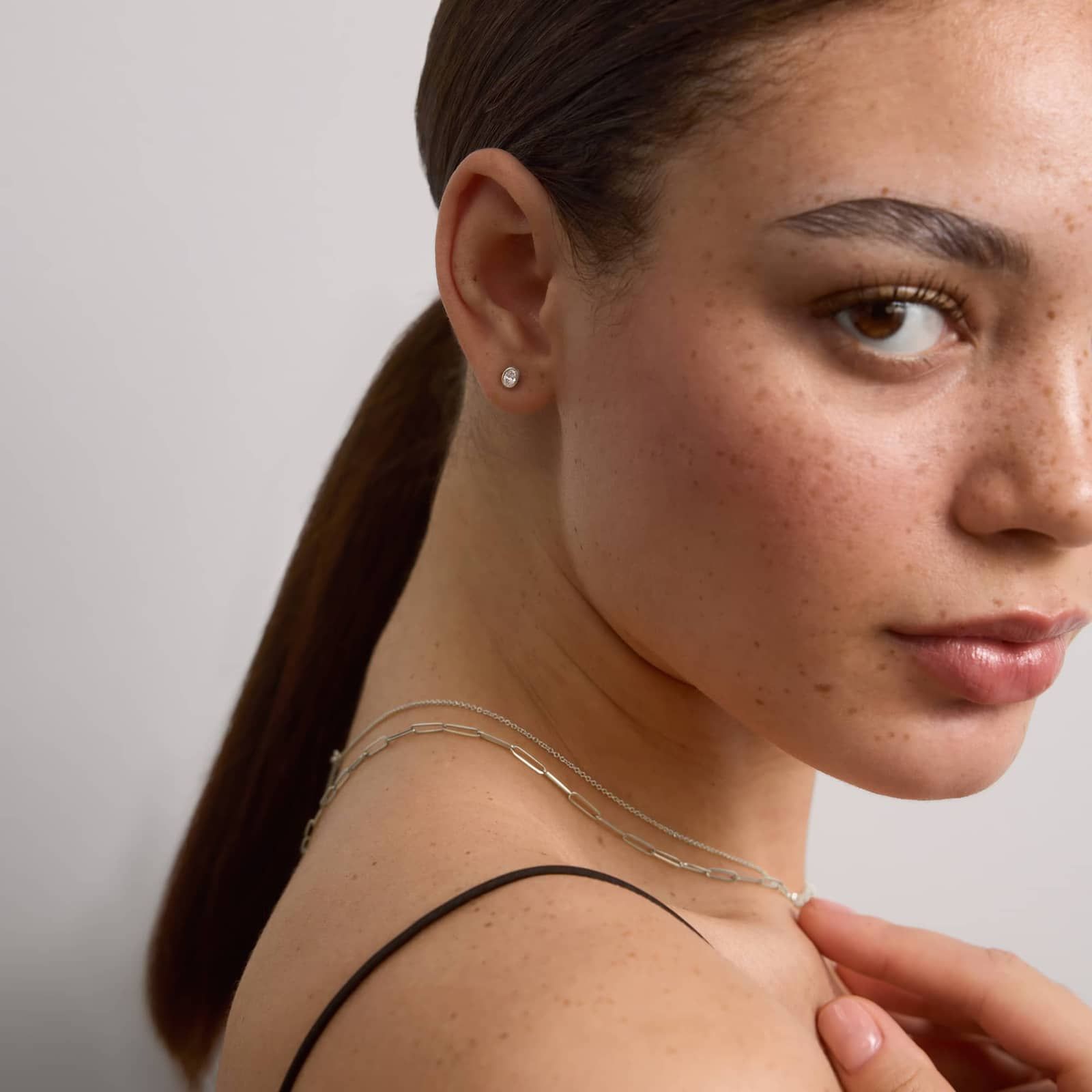 Bezel Stud Earrings With 0.25 CTW Oval Cut Lab-Grown Diamonds in 14K White Gold