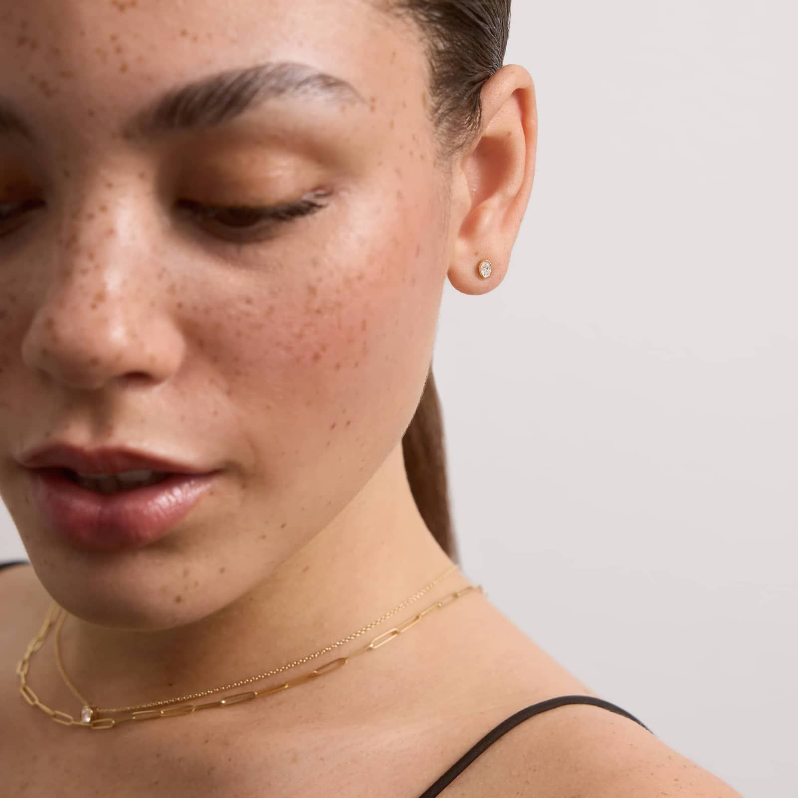 Bezel Stud Earrings With 0.25 CTW Oval Cut Lab-Grown Diamonds in 14K Yellow Gold