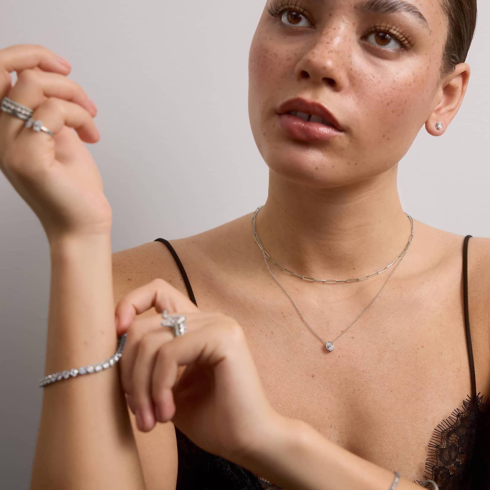 Bezel Stud Earrings With 0.5 CTW Oval Cut Lab-Grown Diamonds in 14K White Gold