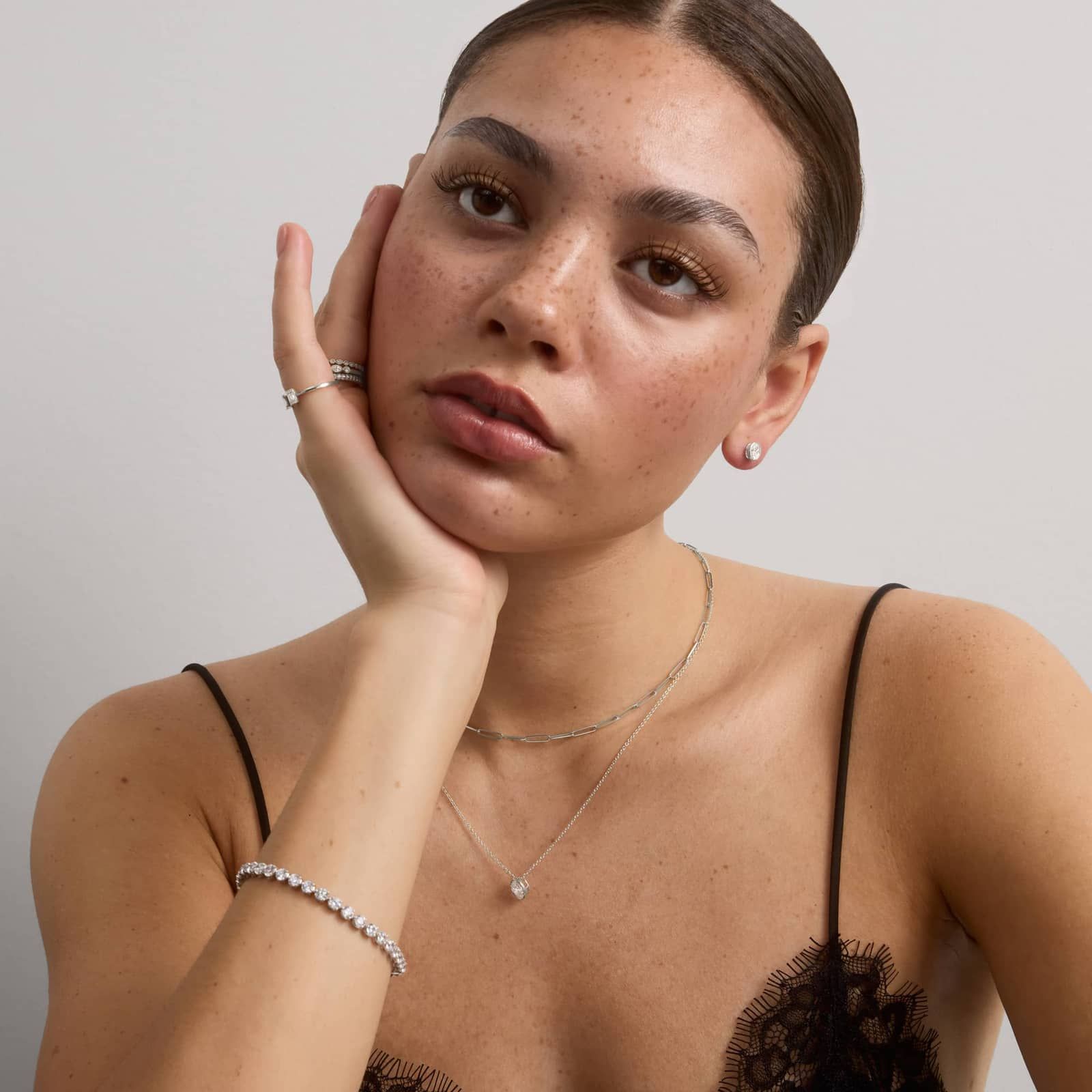 Bezel Stud Earrings With 0.75 CTW Oval Cut Lab-Grown Diamonds in 14K White Gold