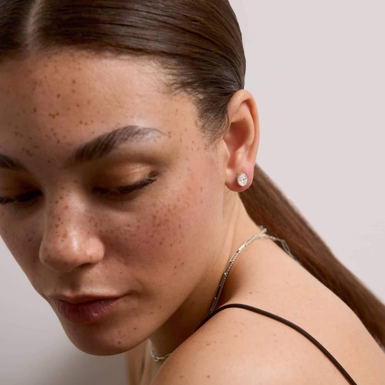 Bezel Stud Earrings With 1.5 CTW Oval Cut Lab-Grown Diamonds in 14K White Gold