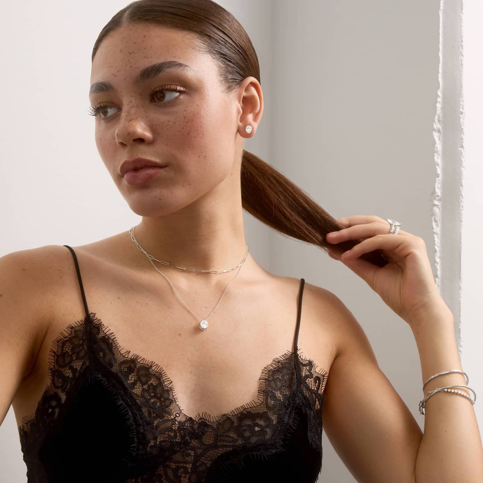 Bezel Stud Earrings With 1.5 CTW Oval Cut Lab-Grown Diamonds in 14K White Gold