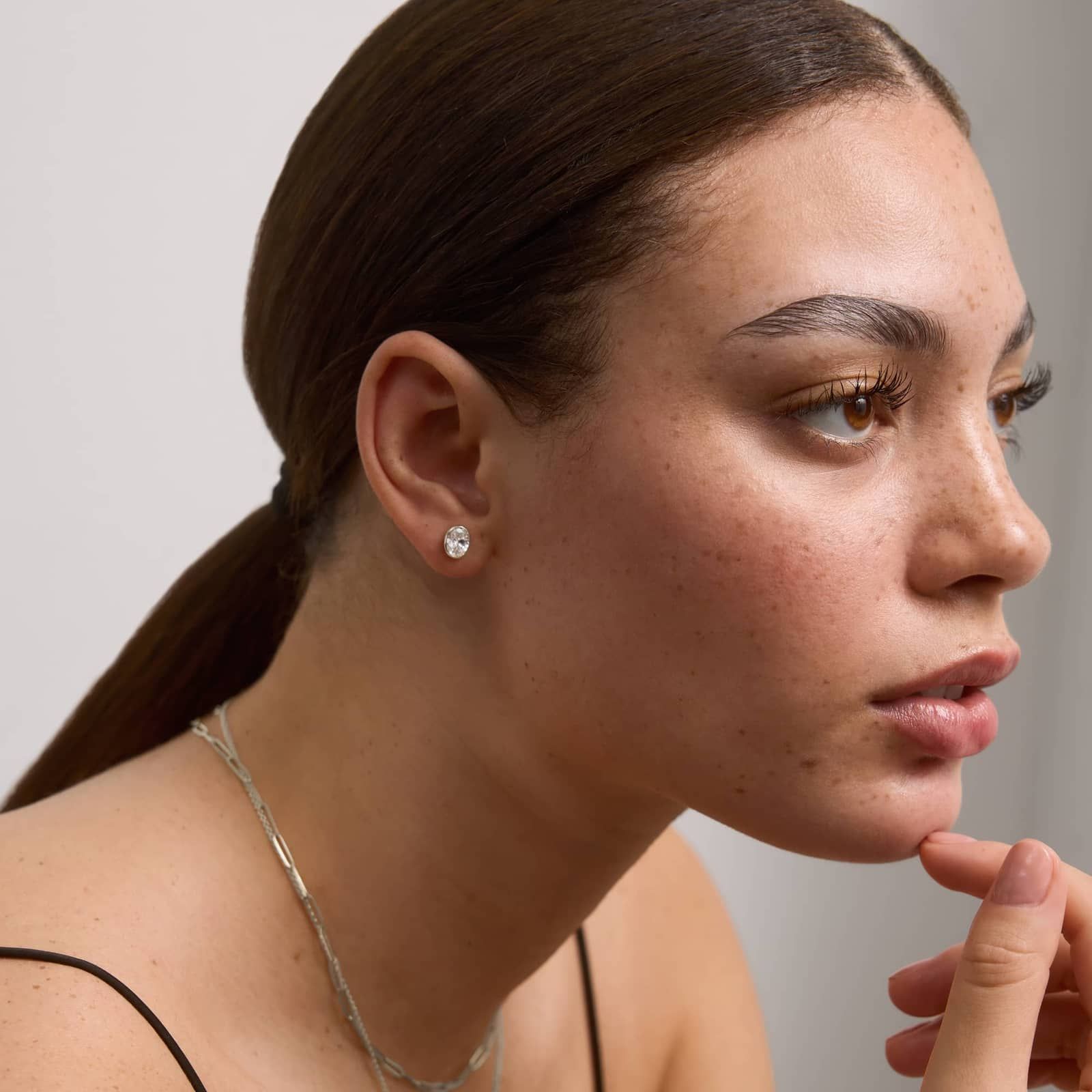 Bezel Stud Earrings With 1.5 CTW Oval Cut Lab-Grown Diamonds in 14K White Gold