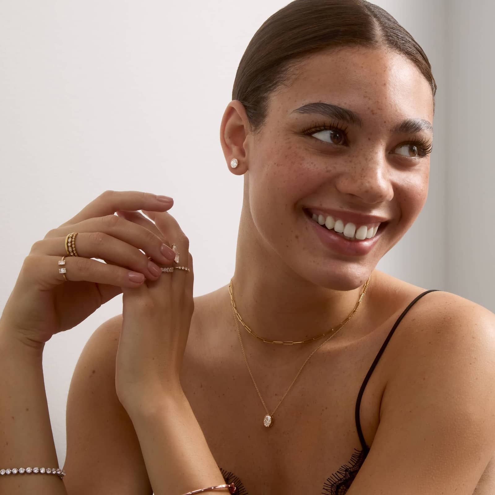 Bezel Stud Earrings With 1.5 CTW Oval Cut Lab-Grown Diamonds in 14K Yellow Gold