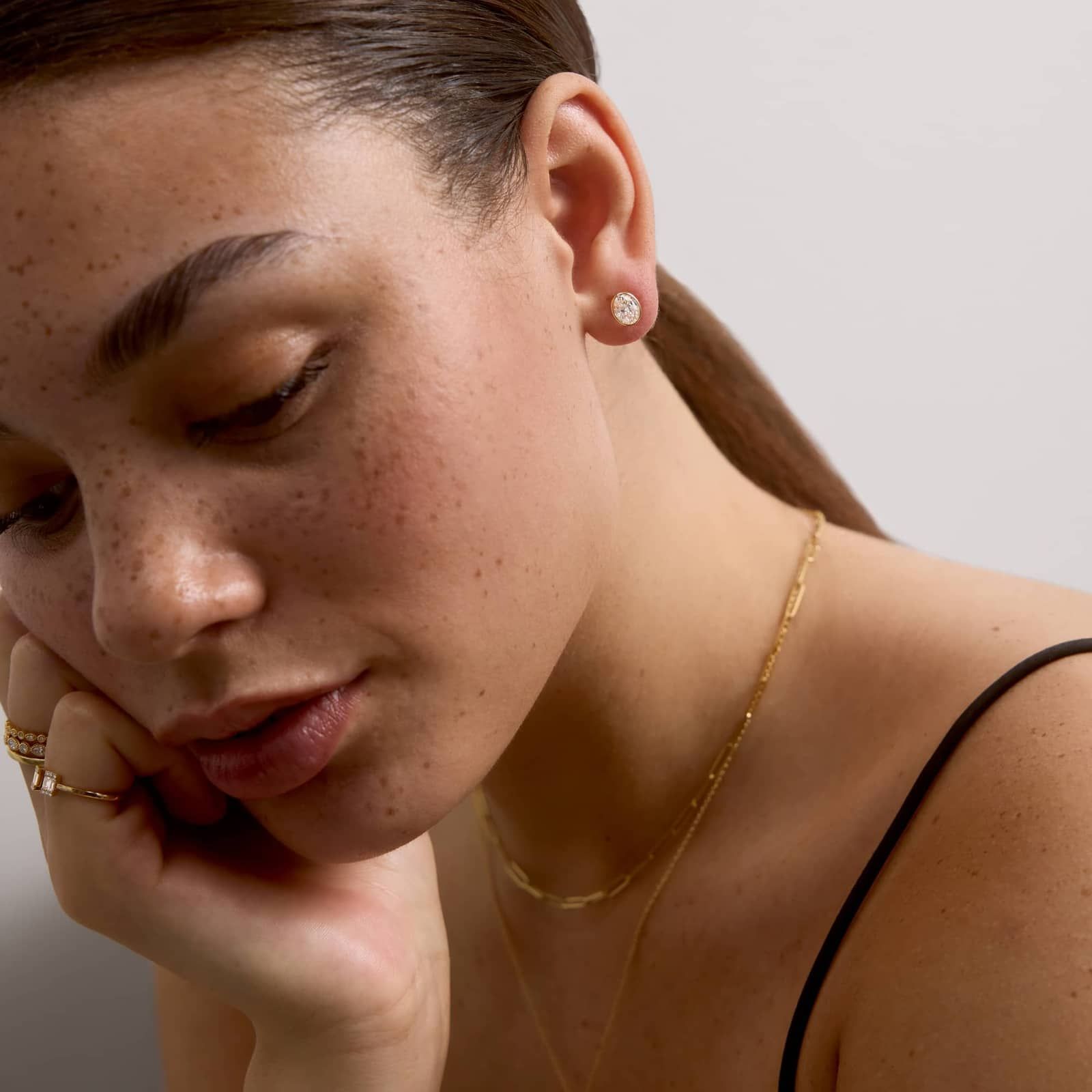 Bezel Stud Earrings With 1.5 CTW Oval Cut Lab-Grown Diamonds in 14K Yellow Gold