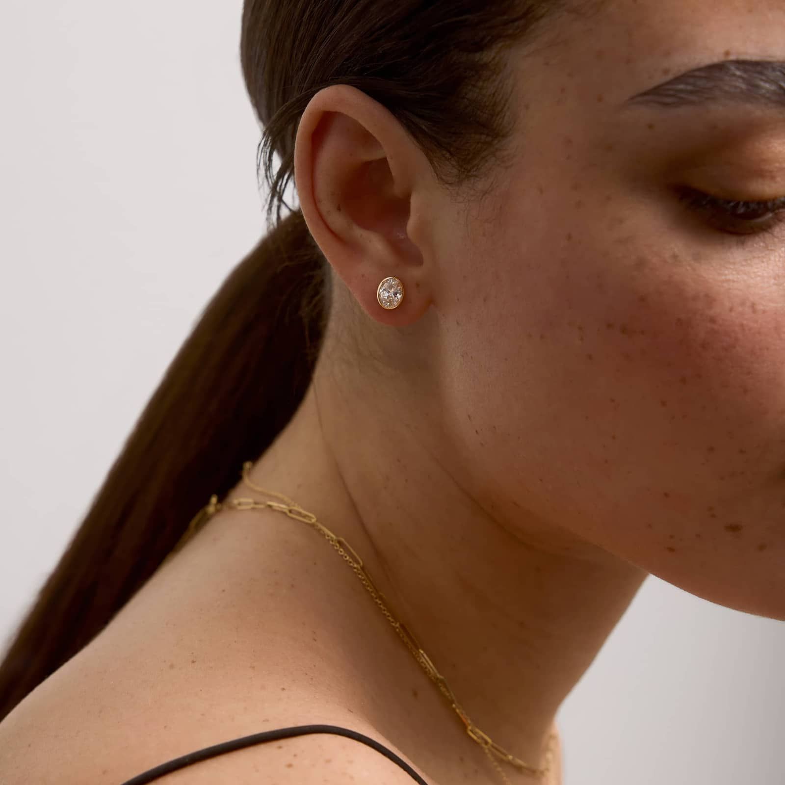 Bezel Stud Earrings With 1.5 CTW Oval Cut Lab-Grown Diamonds in 14K Yellow Gold