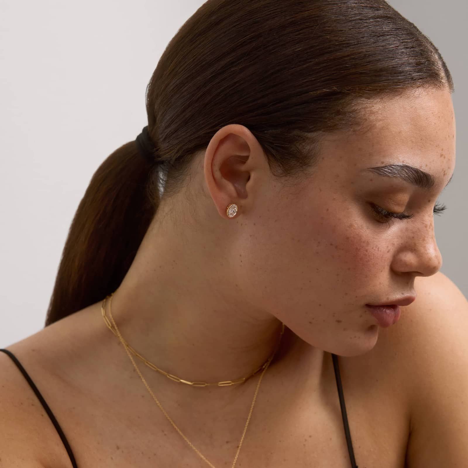 Bezel Stud Earrings With 2 CTW Oval Cut Lab-Grown Diamonds in 14K Yellow Gold