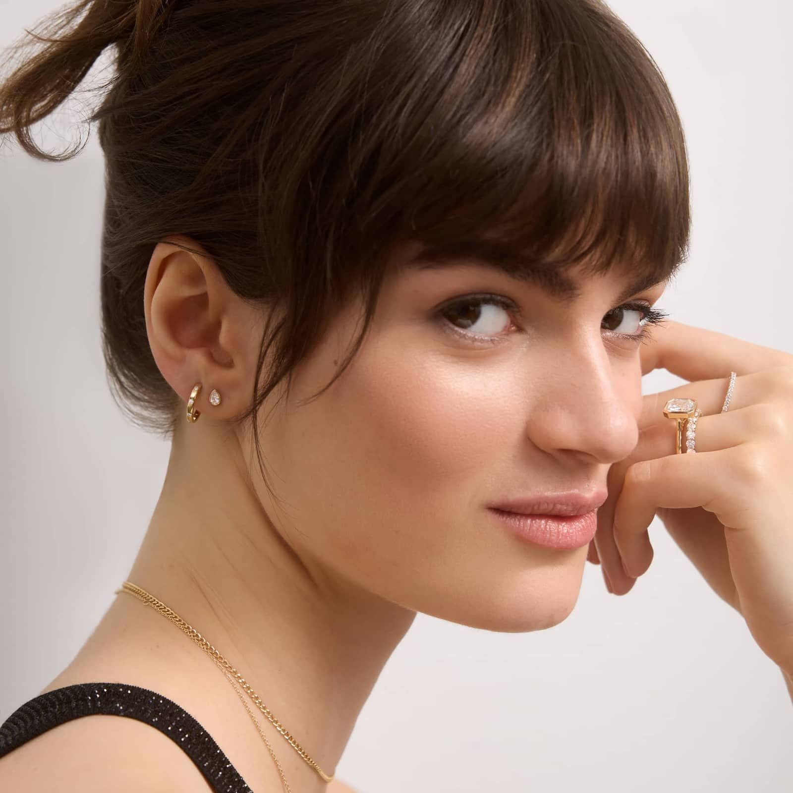 Bezel Diamond Stud Earrings With 0.25 CTW Pear Shaped Diamonds in 14K Yellow Gold