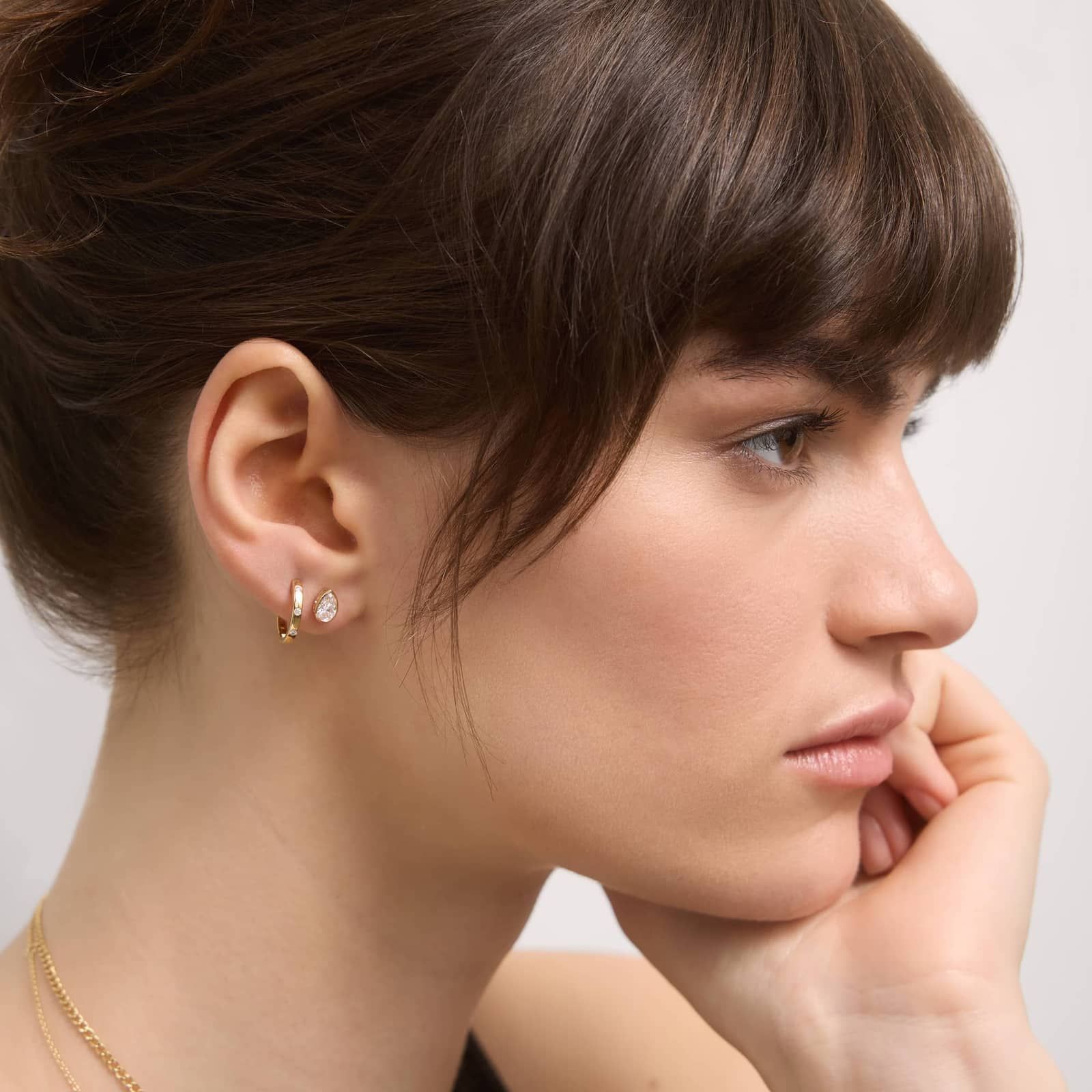 Bezel Diamond Stud Earrings With 0.75 CTW Pear Shaped Diamonds in 14K Yellow Gold