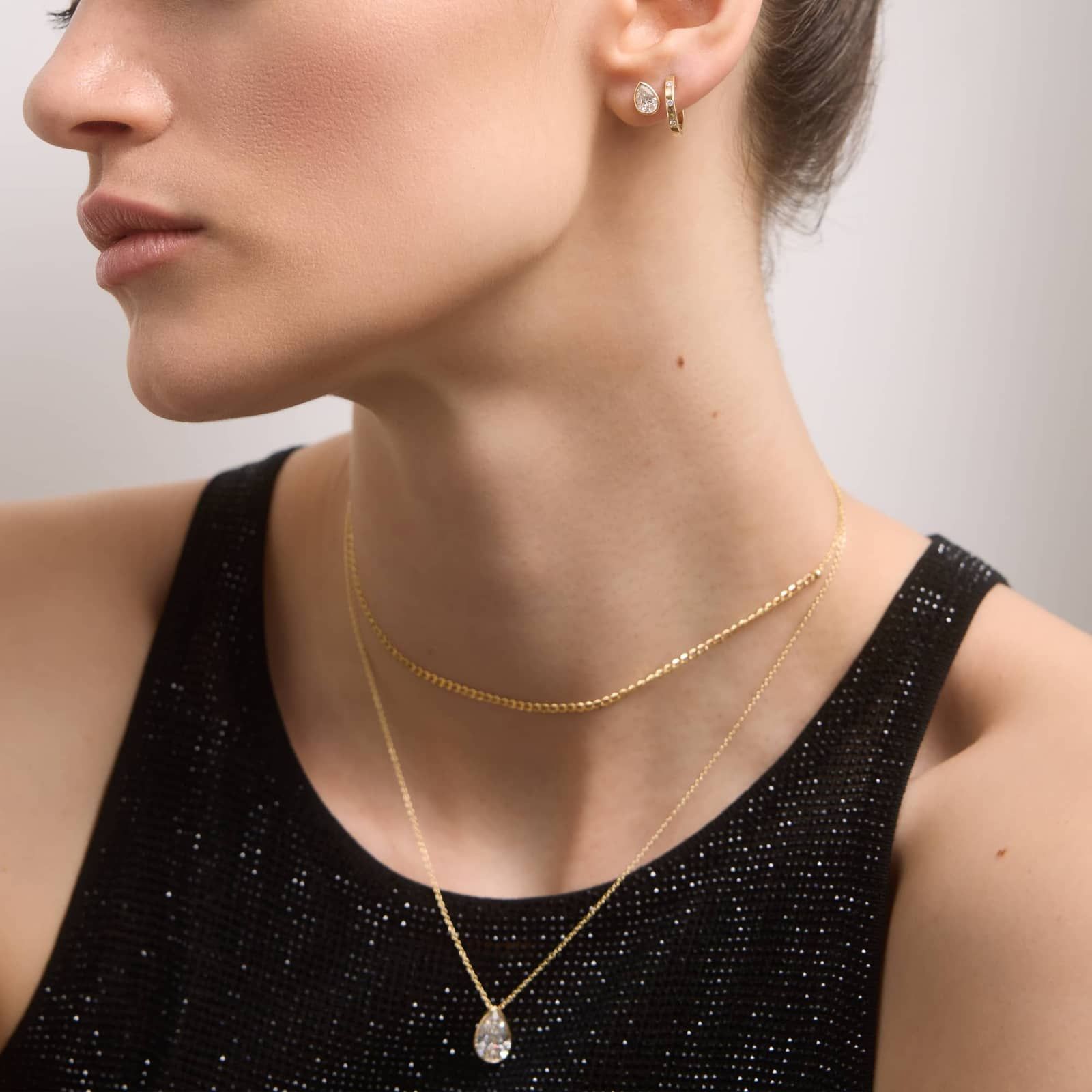 Bezel Diamond Stud Earrings With 1 CTW Pear Shaped Diamonds in 14K Yellow Gold