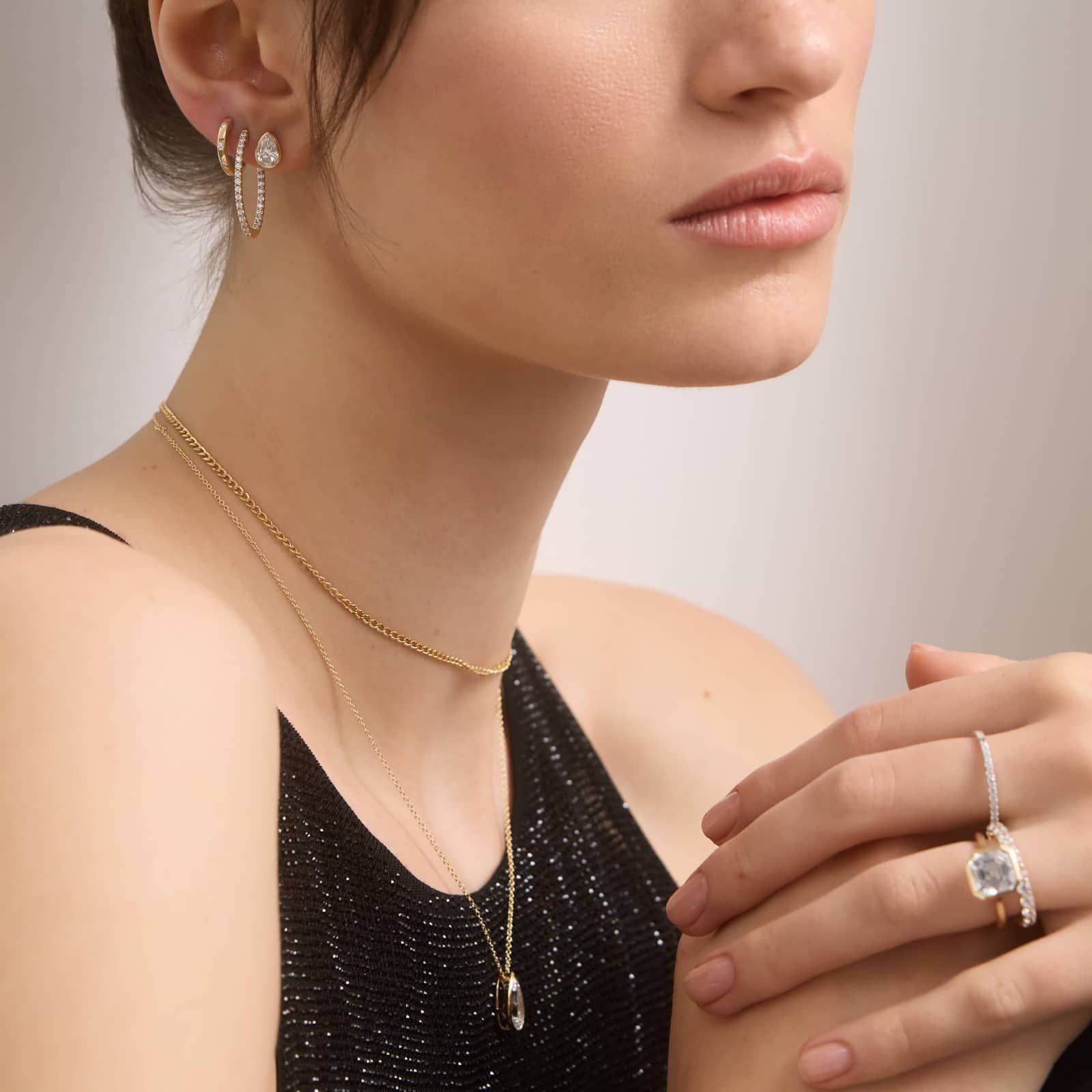 Bezel Diamond Stud Earrings With 1.5 CTW Pear Shaped Diamonds in 14K Yellow Gold