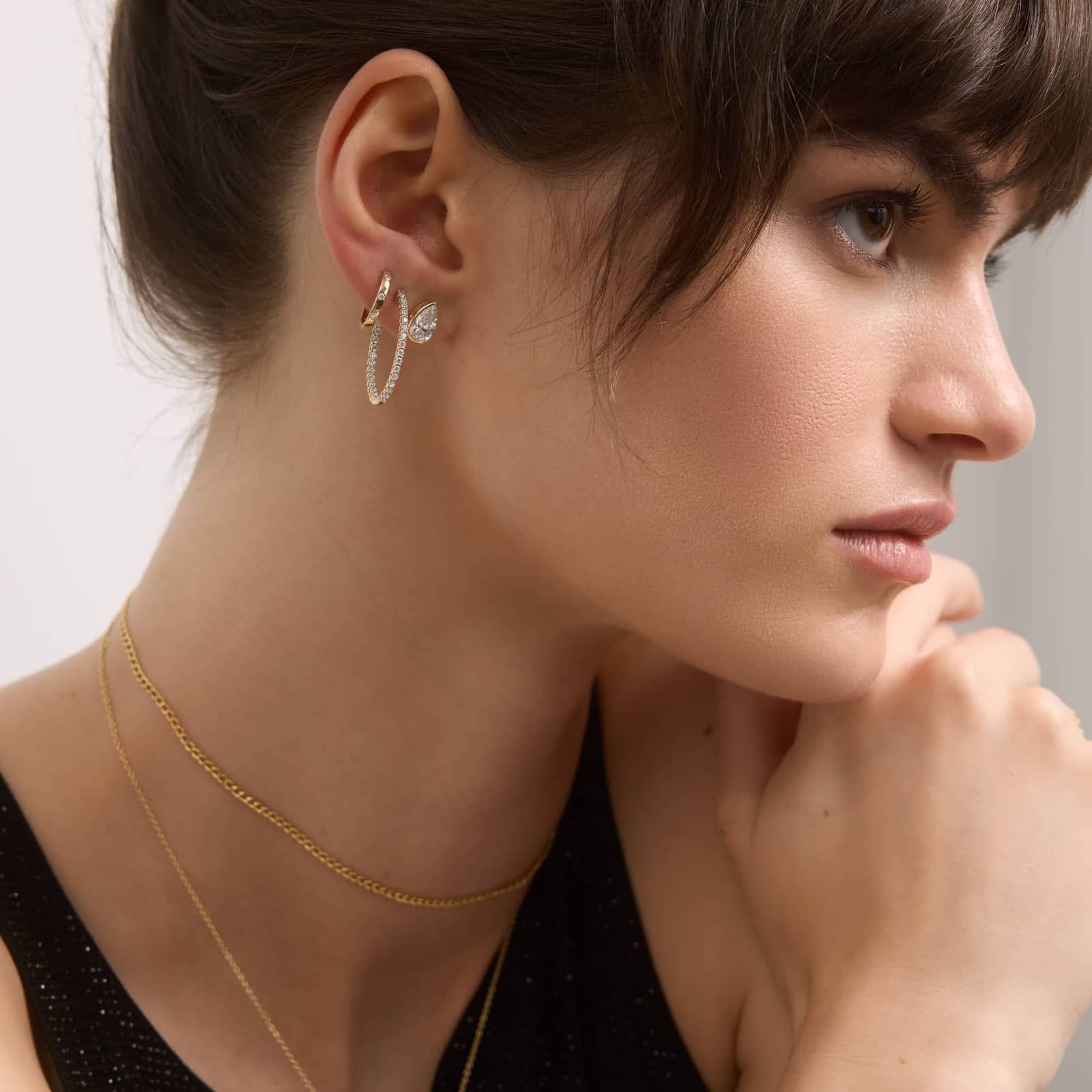 Bezel Diamond Stud Earrings With 2 CTW Pear Shaped Diamonds in 14K Yellow Gold