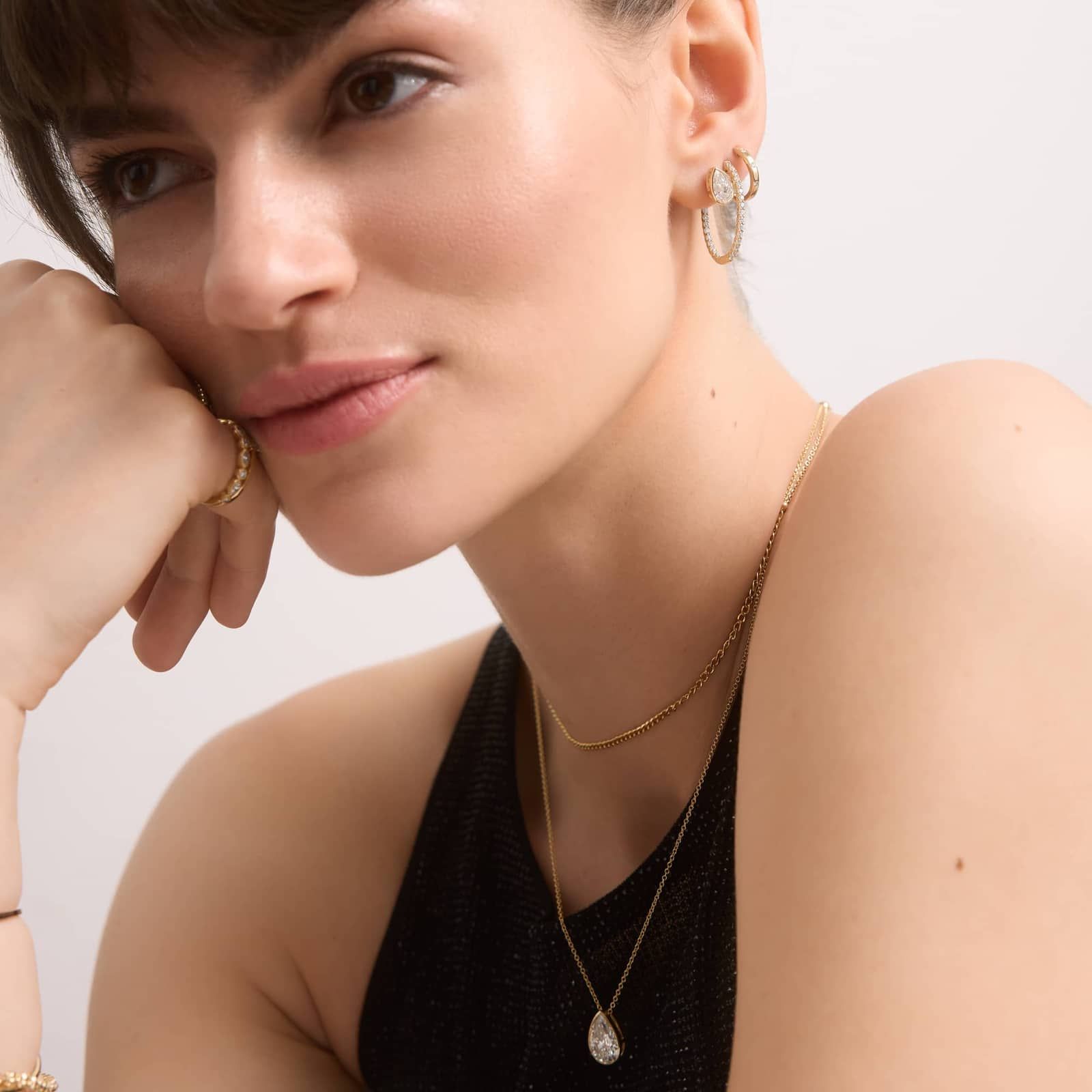 Bezel Diamond Stud Earrings With 2 CTW Pear Shaped Diamonds in 14K Yellow Gold