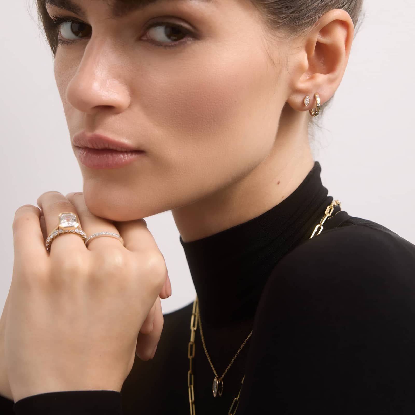 Bezel Diamond Stud Earrings With 0.25 CTW Marquise Cut Diamonds in 14K Yellow Gold