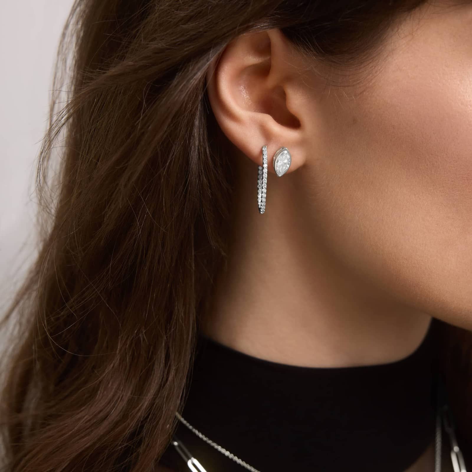 Bezel Diamond Stud Earrings With 2 CTW Marquise Cut Diamonds in Platinum