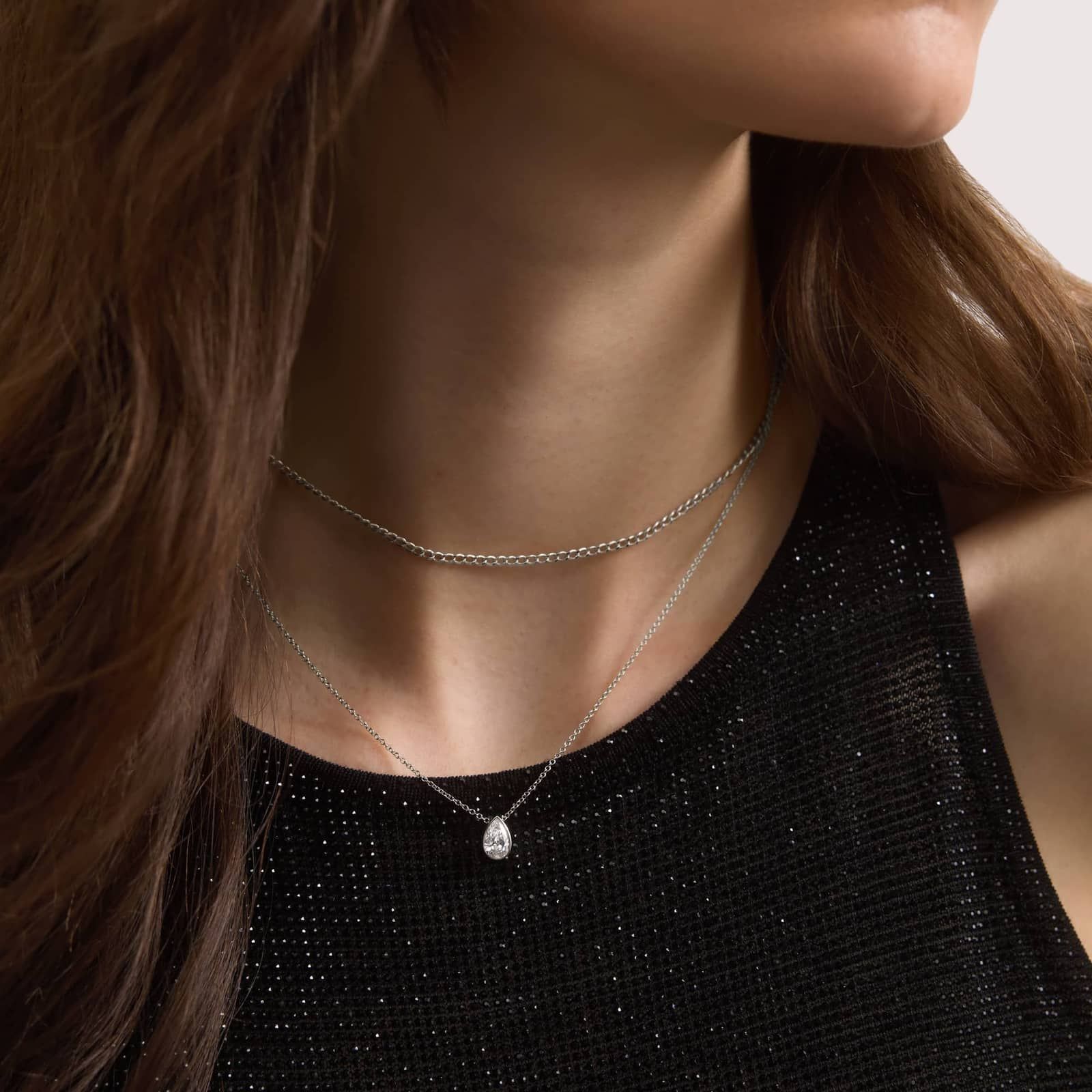 Bezel Solitaire Pendant Necklace With 0.75 CTW Pear Shaped Diamond in 14K White Gold