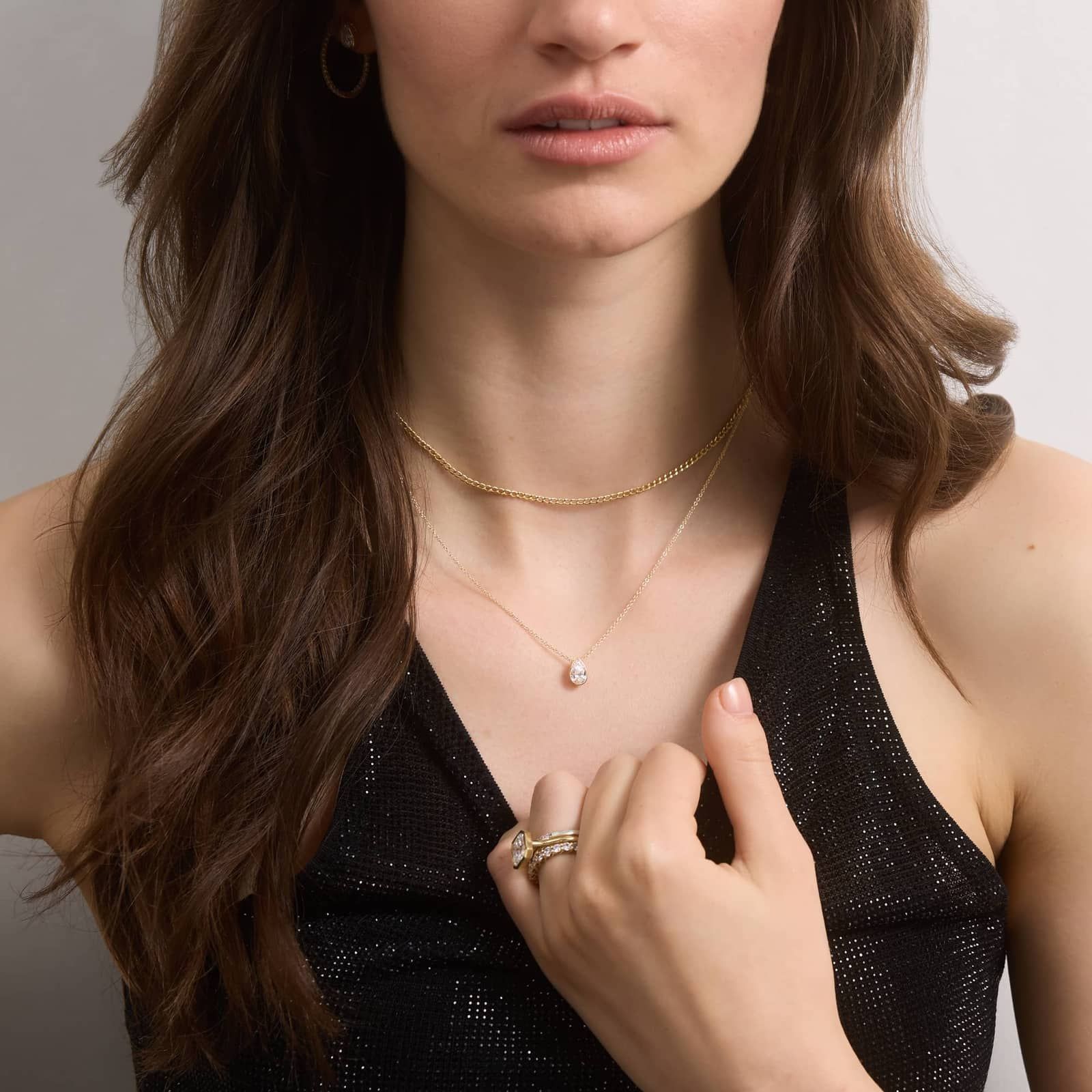 Bezel Solitaire Pendant Necklace With 0.75 CTW Pear Shaped Diamond in 14K Yellow Gold