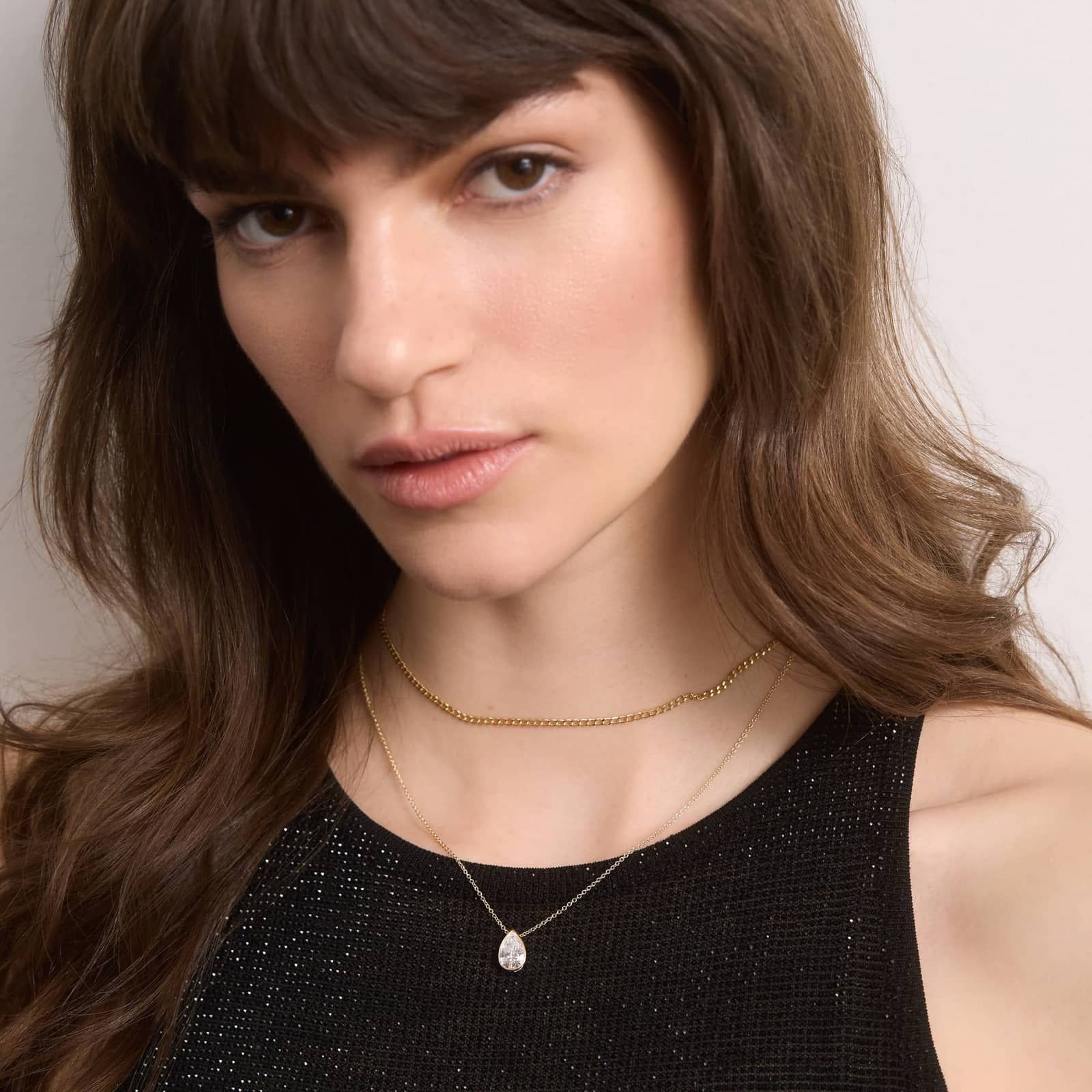 Bezel Solitaire Pendant Necklace With 1.5 CTW Pear Shaped Lab-Grown Diamond in 14K Yellow Gold