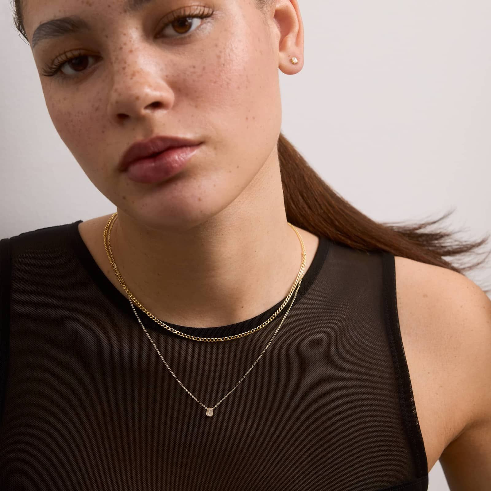 Bezel Solitaire Pendant Necklace With 0.25 CTW Emerald Cut Lab-Grown Diamond in 14K Yellow Gold