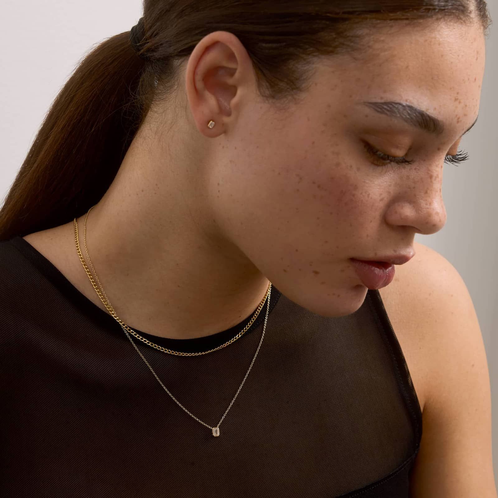 Bezel Solitaire Pendant Necklace With 0.25 CTW Emerald Cut Lab-Grown Diamond in 14K Yellow Gold