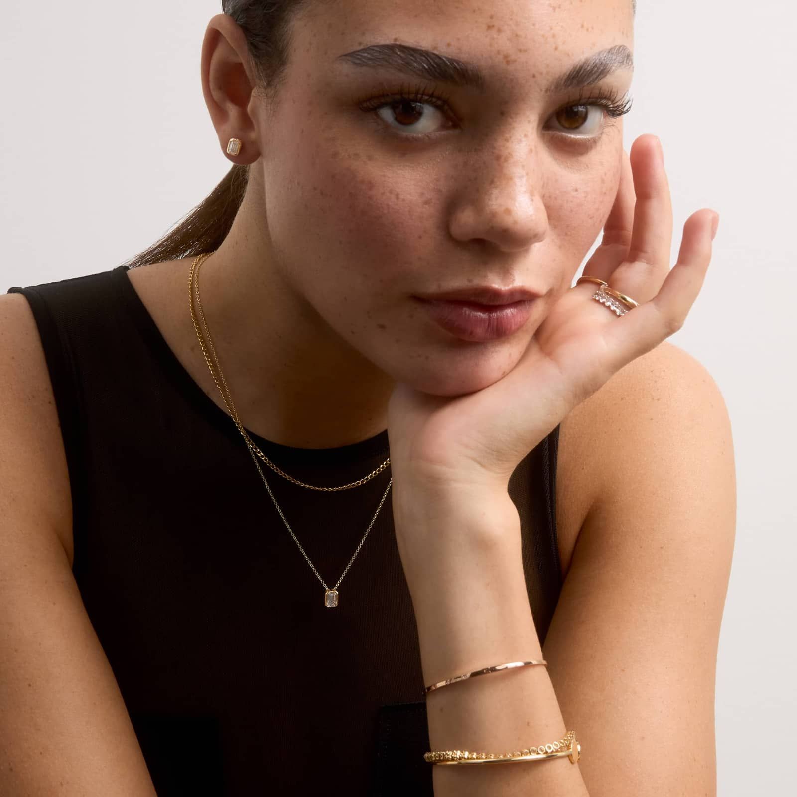 Bezel Solitaire Pendant Necklace With 0.75 CTW Emerald Cut Lab-Grown Diamond in 14K Yellow Gold