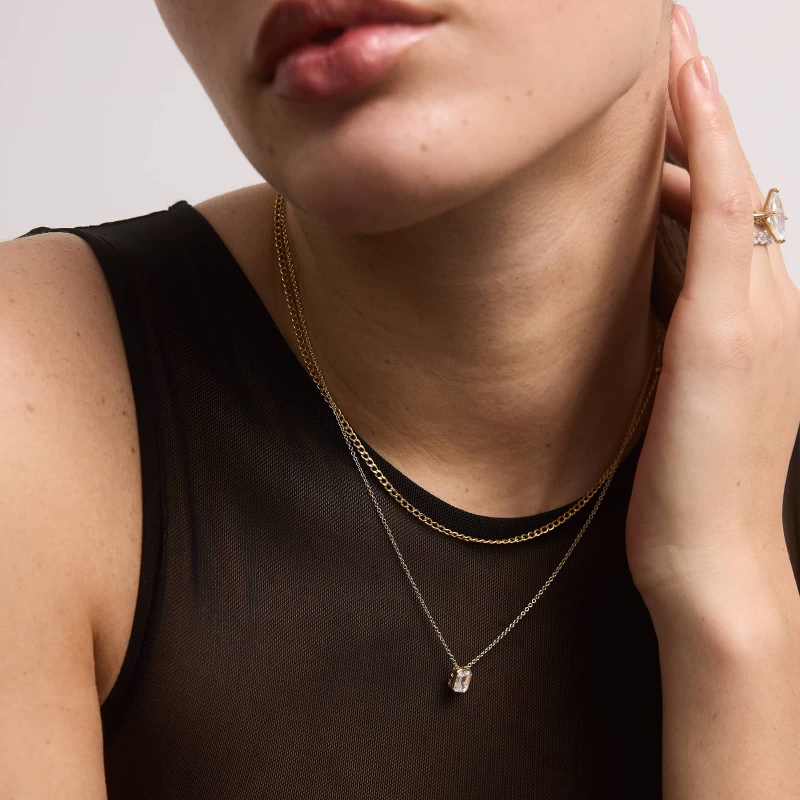 Bezel Solitaire Pendant Necklace With 0.75 CTW Emerald Cut Lab-Grown Diamond in 14K Yellow Gold