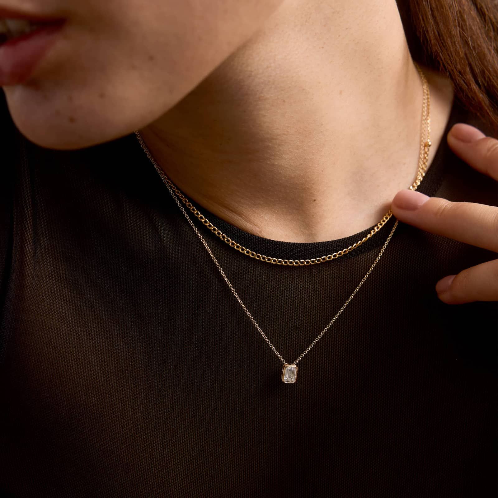 Bezel Solitaire Pendant Necklace With 0.75 CTW Emerald Cut Lab-Grown Diamond in 14K Yellow Gold