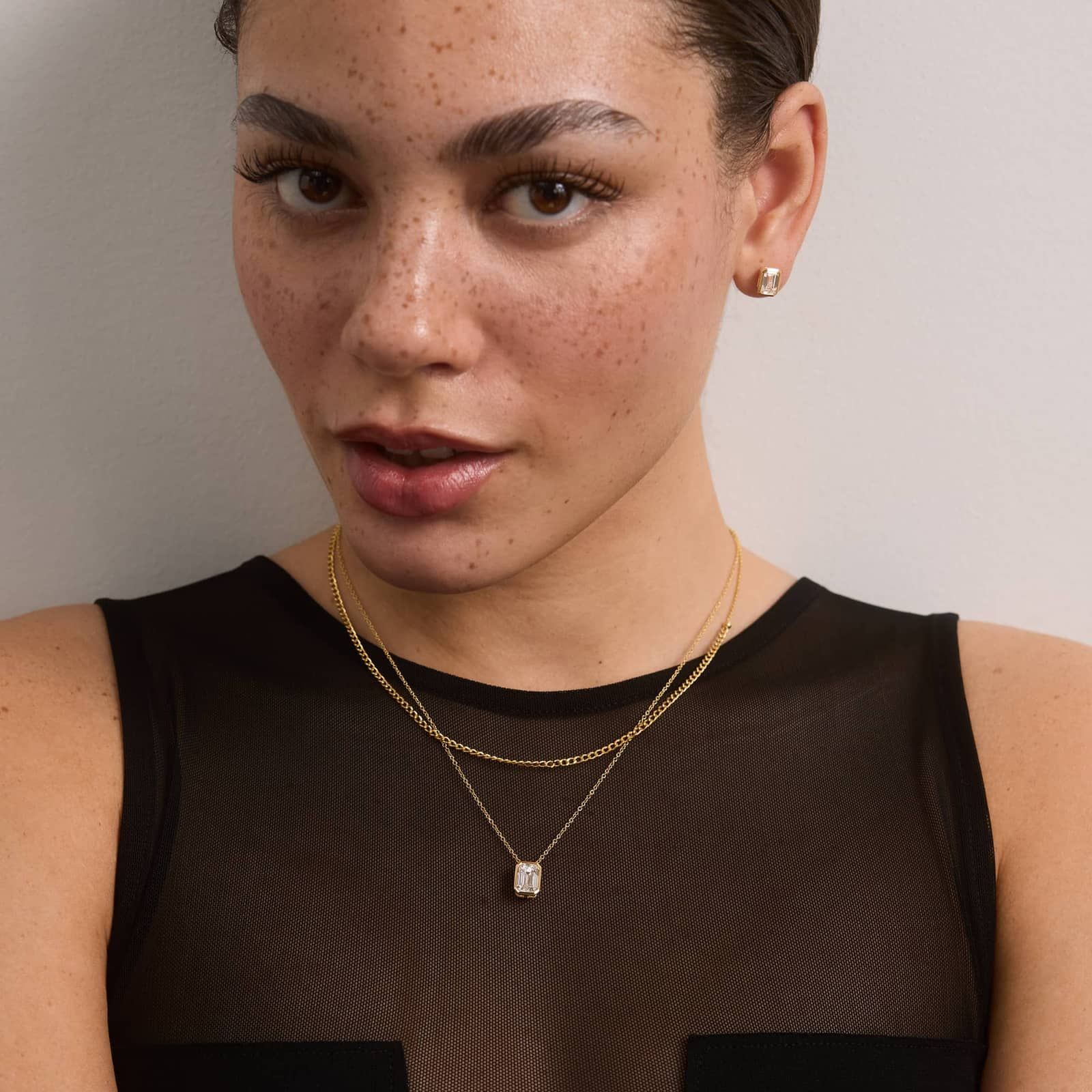 Bezel Solitaire Pendant Necklace With 2 CTW Emerald Cut Lab-Grown Diamond in 14K Yellow Gold