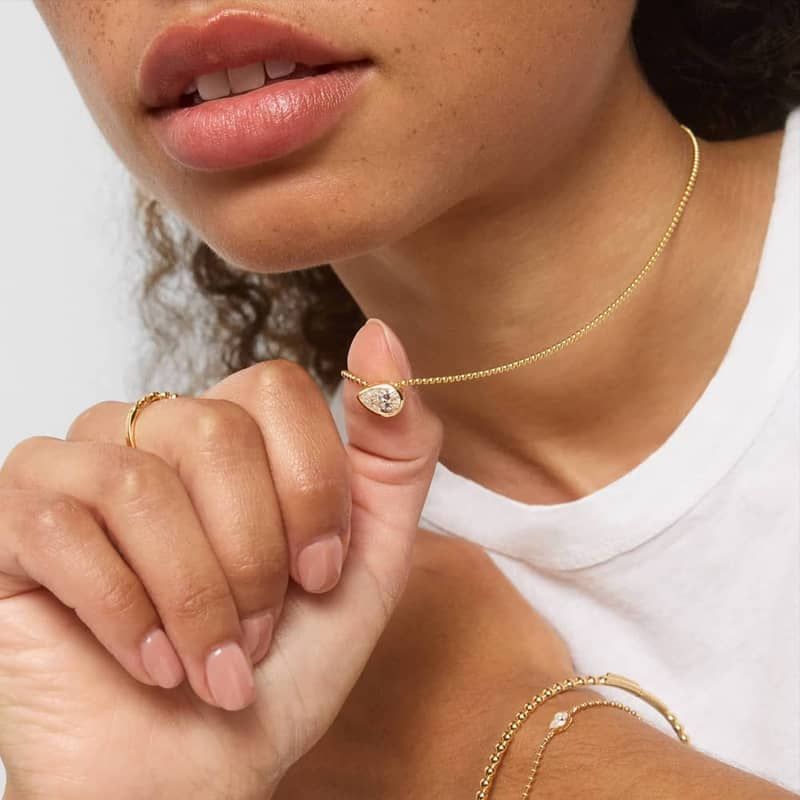 East-West Bezel Solitaire Bead Chain Necklace With 1 CTW Pear Shaped Lab-Grown Diamond In 14K Yellow Gold