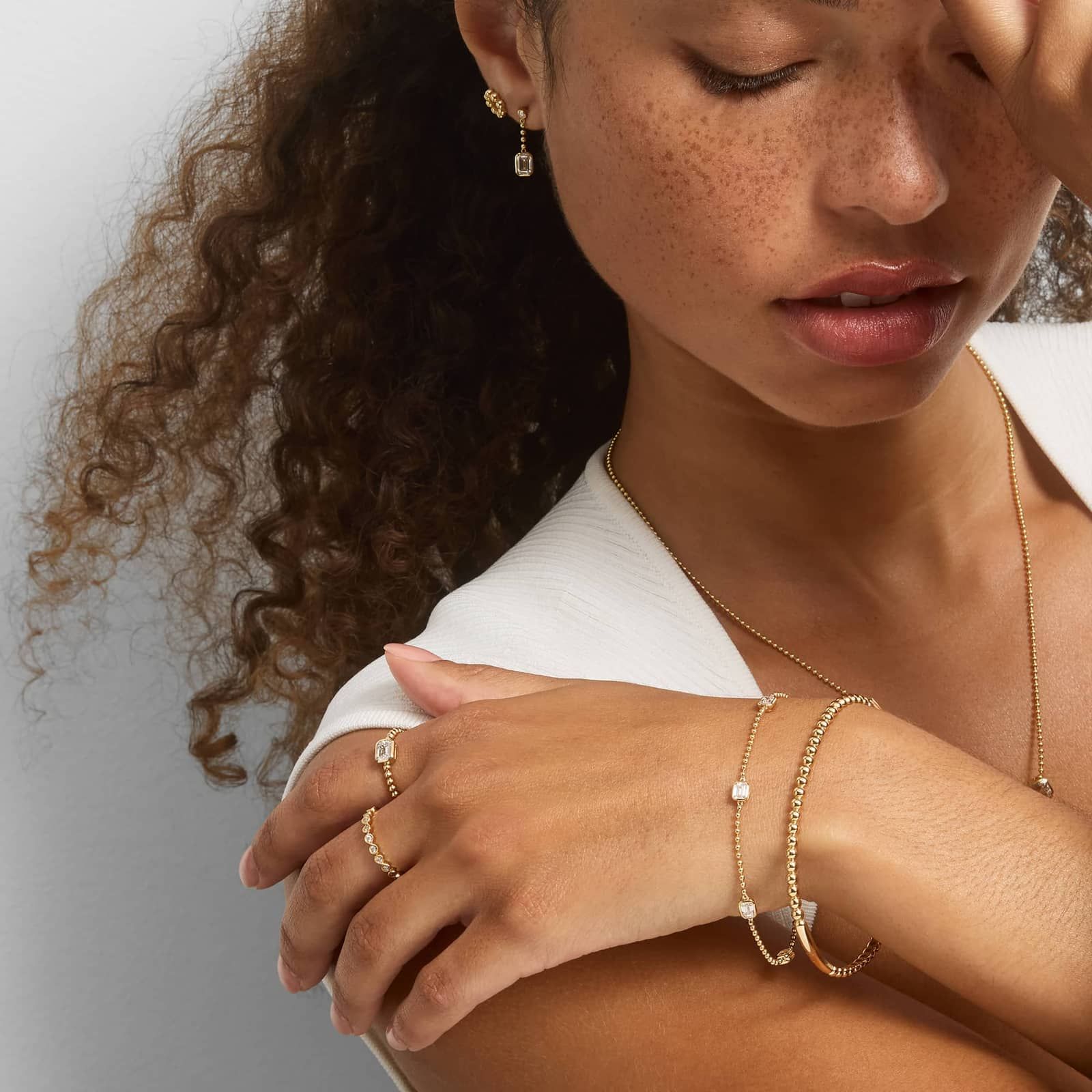 East-West Bezel Beaded Station Bracelet With 1 CTW Emerald Cut Lab-Grown Diamonds in 14K Yellow Gold