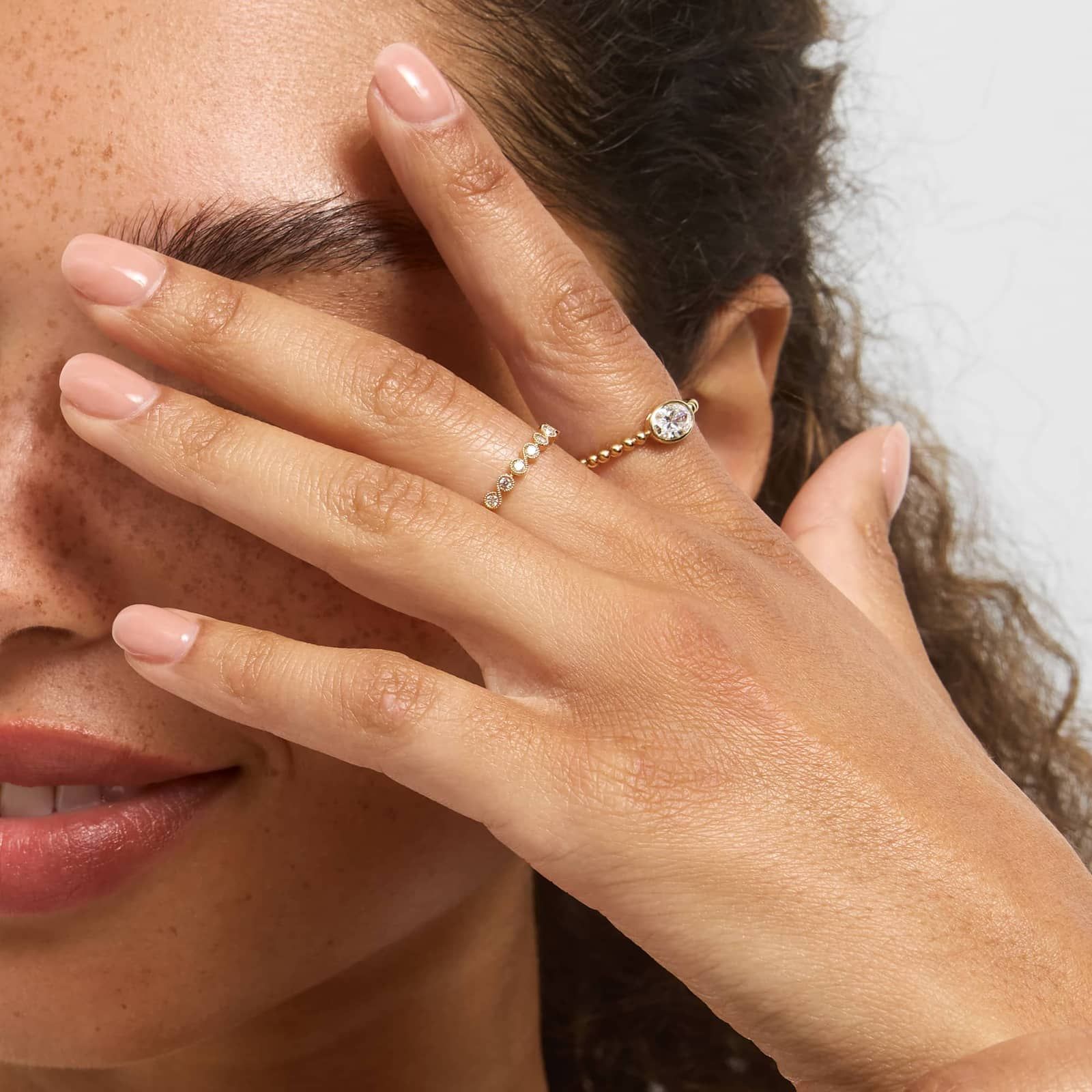 East-West Bezel Beaded Ring With 0.5 CTW Oval Cut Lab-Grown Diamond in 14K Yellow Gold