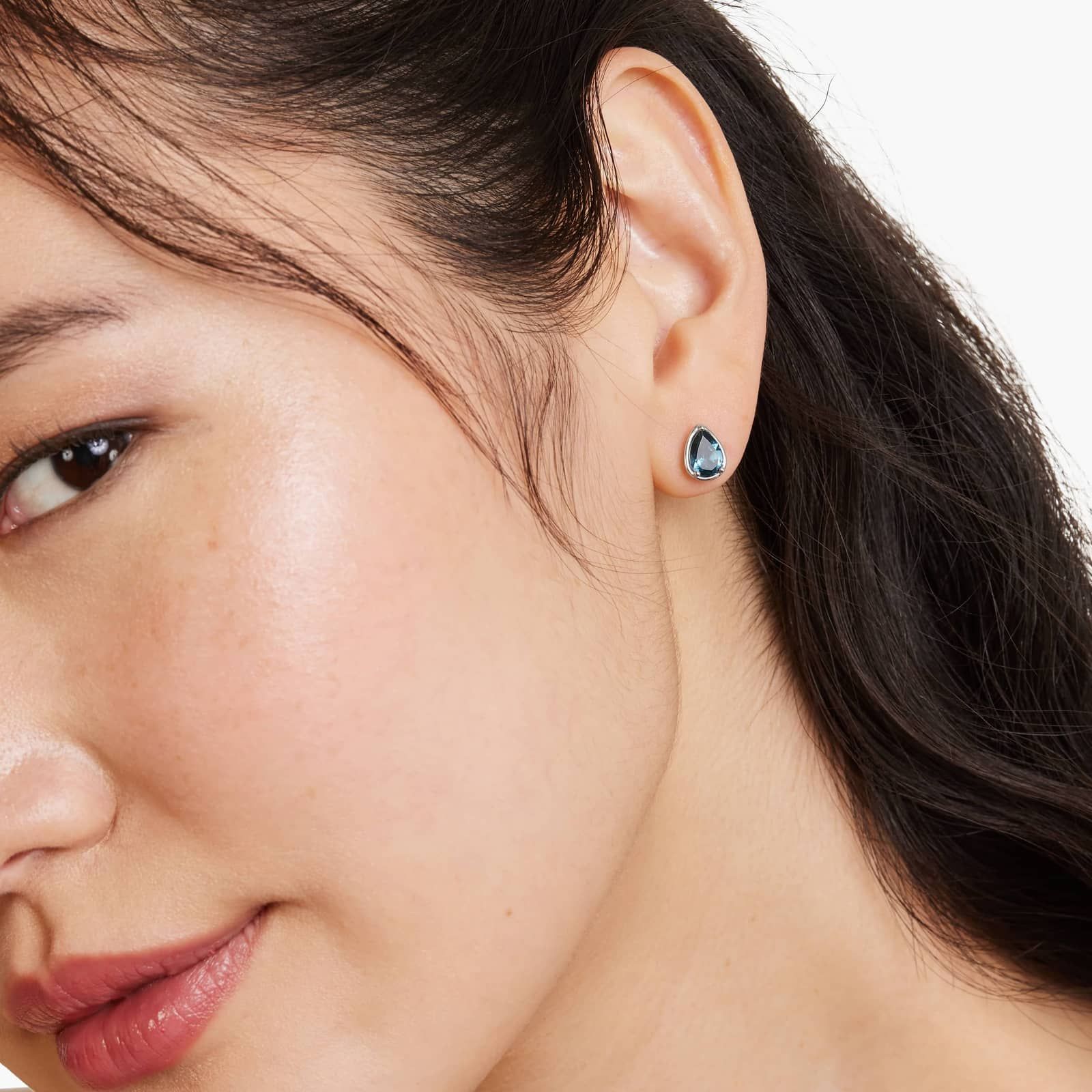 Radiant Reflections Pear Shape Blue Topaz Stud Earrings In 14K White Gold