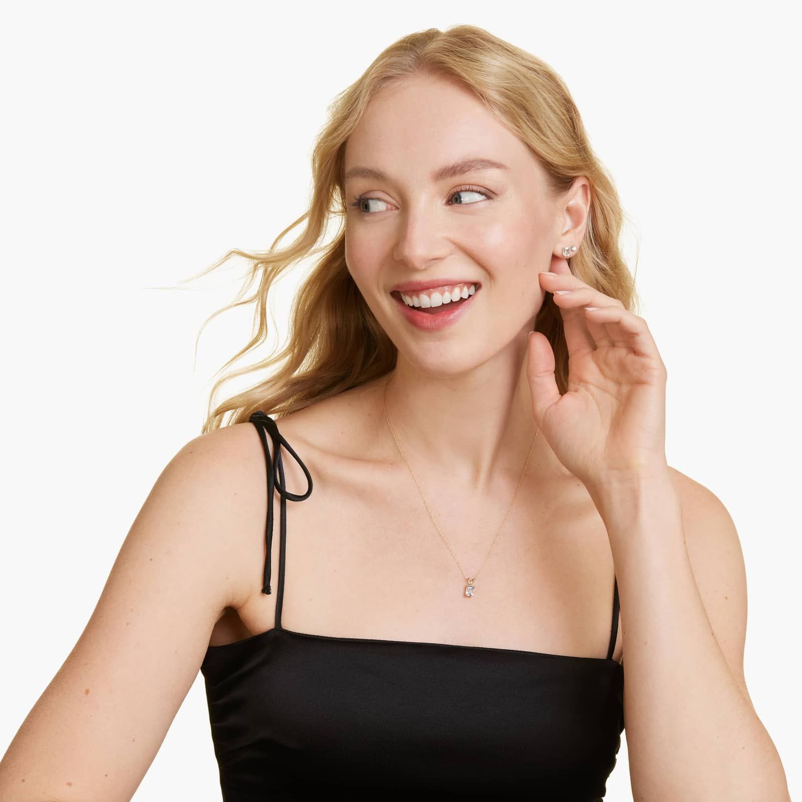 Emerald Cut White Topaz Birthstone Stud Earrings In 14K Yellow Gold