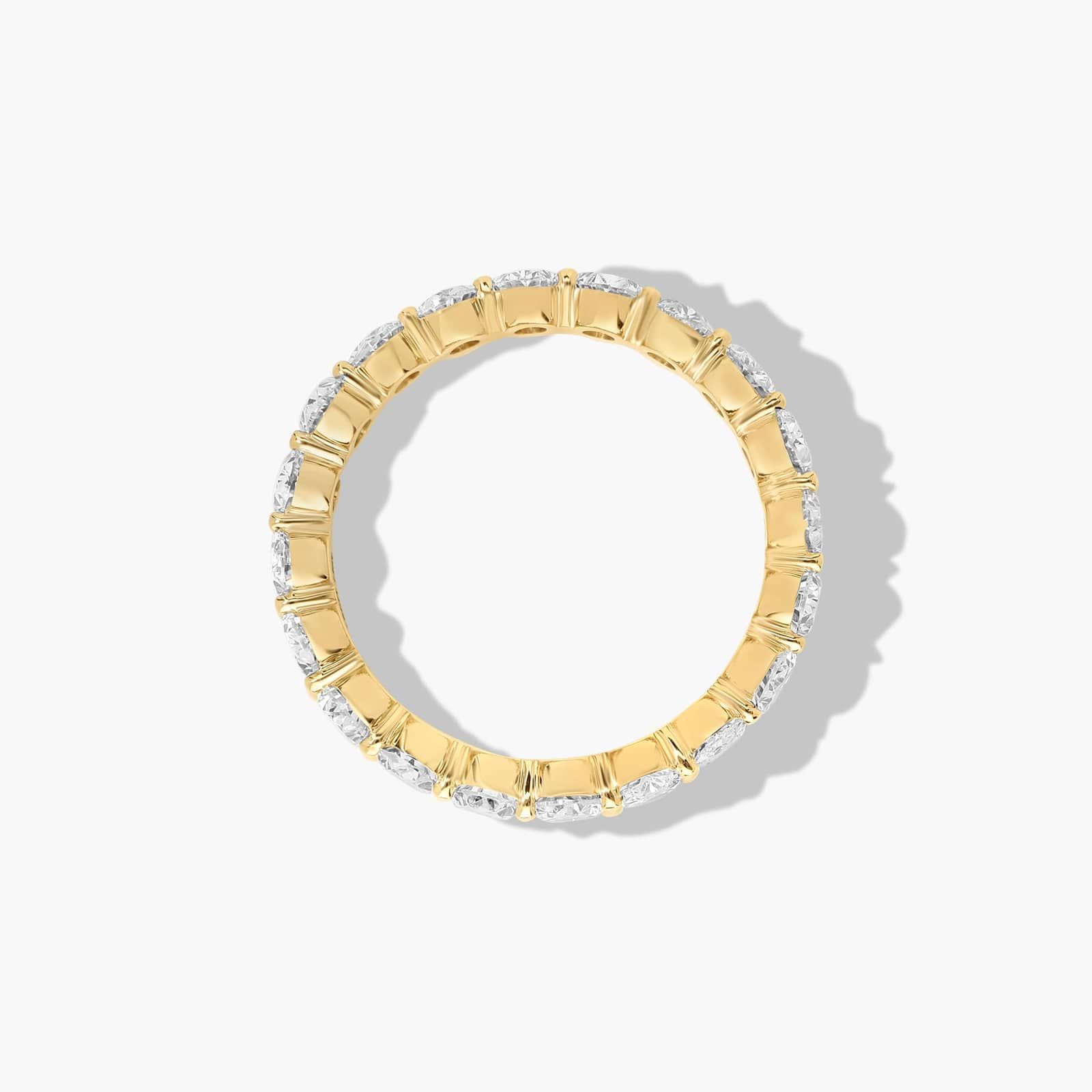 Eternity Ring With 3 CTW Oval Cut Lab-Grown Diamonds In 14K Yellow Gold (4.00mm)