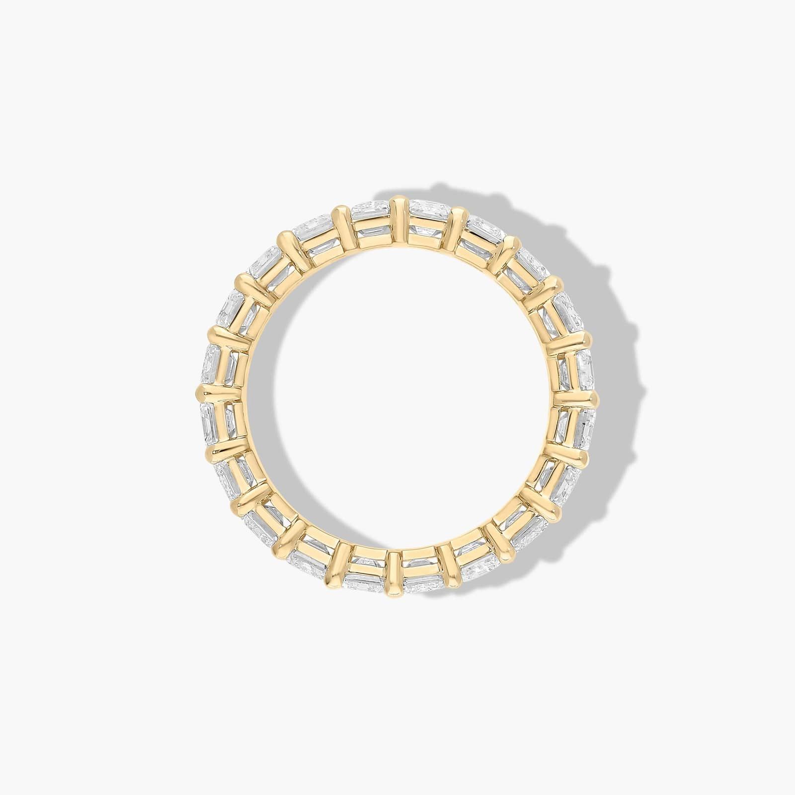 Eternity Ring With 5 CTW Emerald Cut Diamonds In 14K Yellow Gold (4.50mm)
