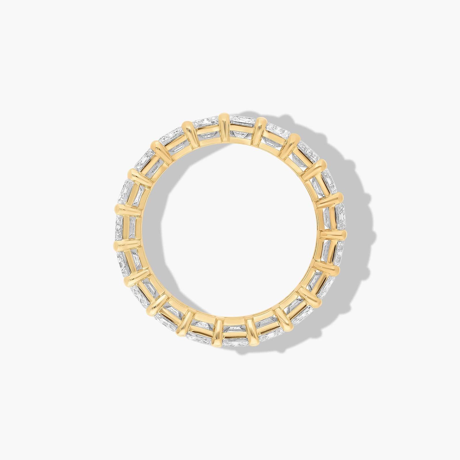 Eternity Ring With 6 CTW Emerald Cut Diamonds In 14K Yellow Gold (5.00mm)