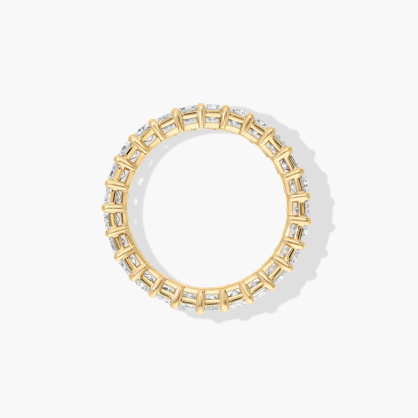 Eternity Ring With 3 CTW Radiant Cut Diamonds In 14K Yellow Gold (4mm)