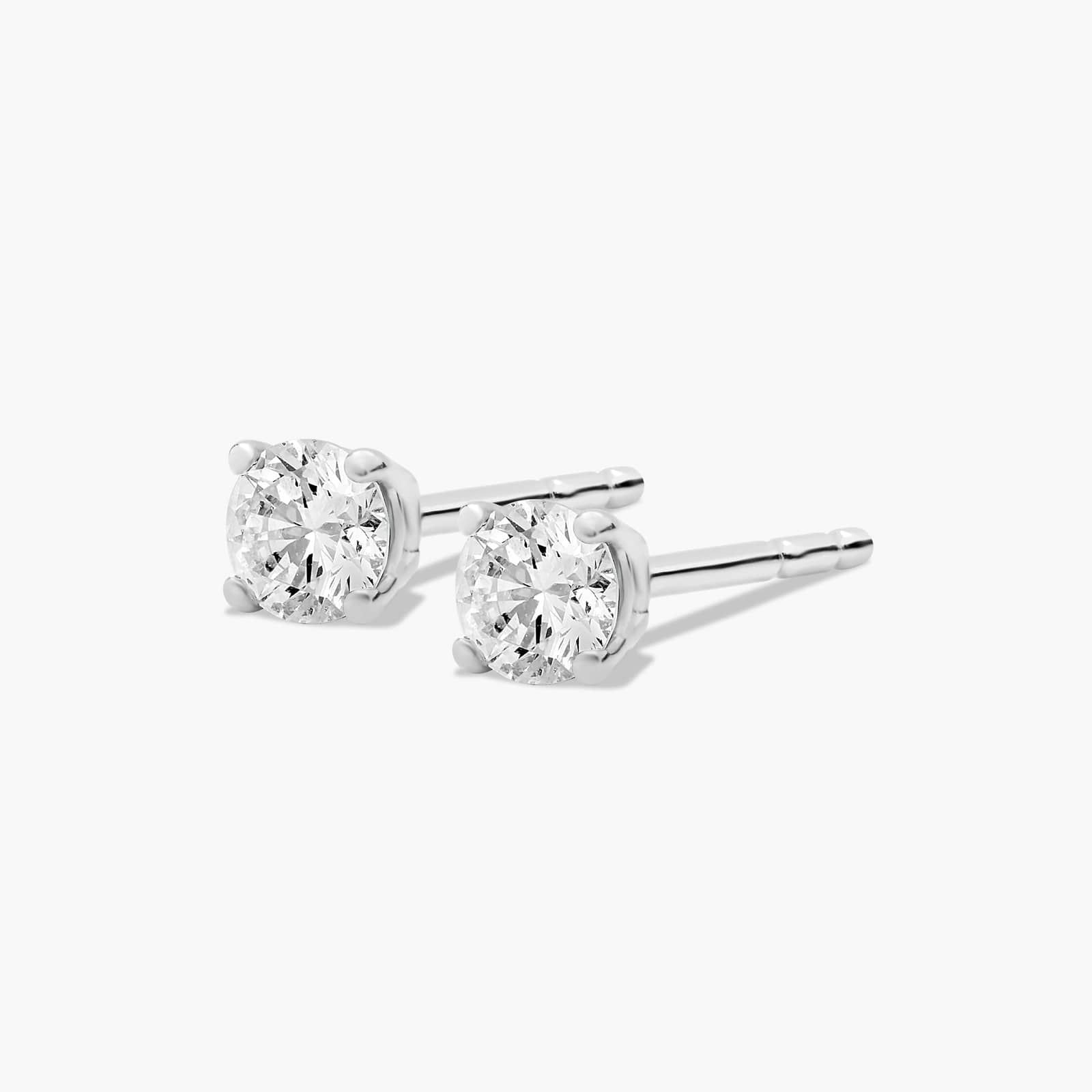 Four Prong 0.25 CTW Round Brilliant Diamond Earrings In Platinum