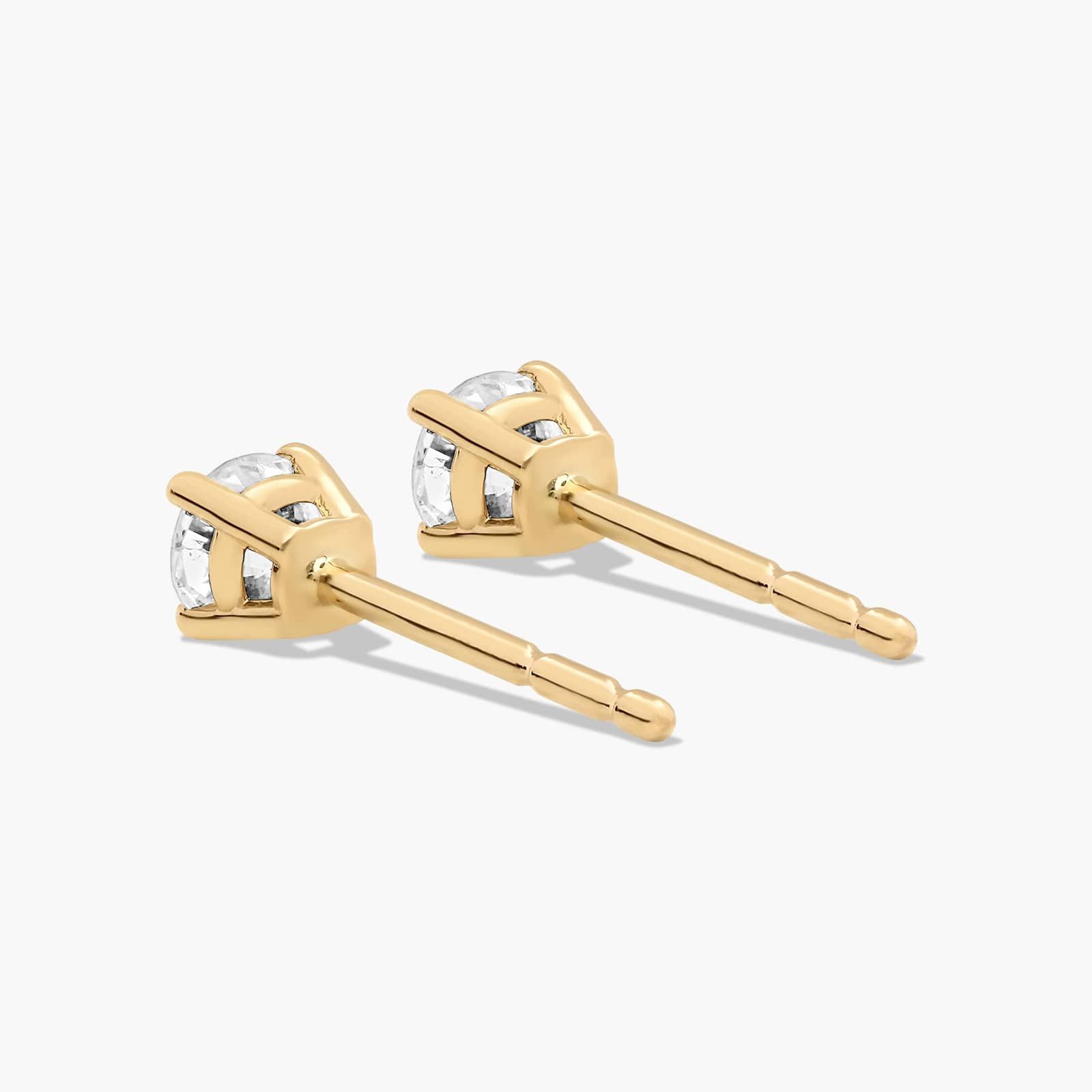 Four Prong 0.25 CTW Round Lab-Grown Diamond Stud Earrings In 14K Yellow Gold