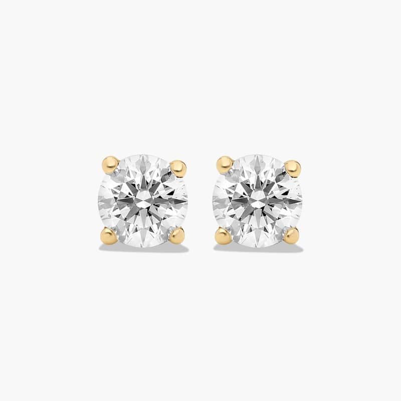 Four Prong 0.5 CTW Round Lab-Grown Diamond Stud Earrings In 14K Yellow Gold
