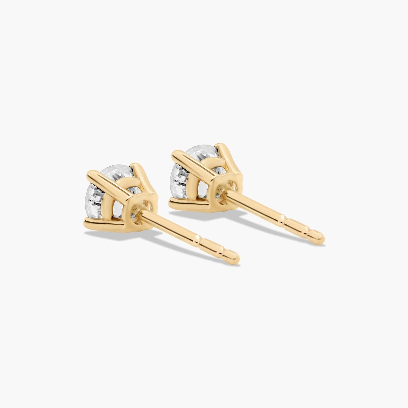 Four Prong 0.5 CTW Round Lab-Grown Diamond Stud Earrings In 14K Yellow Gold