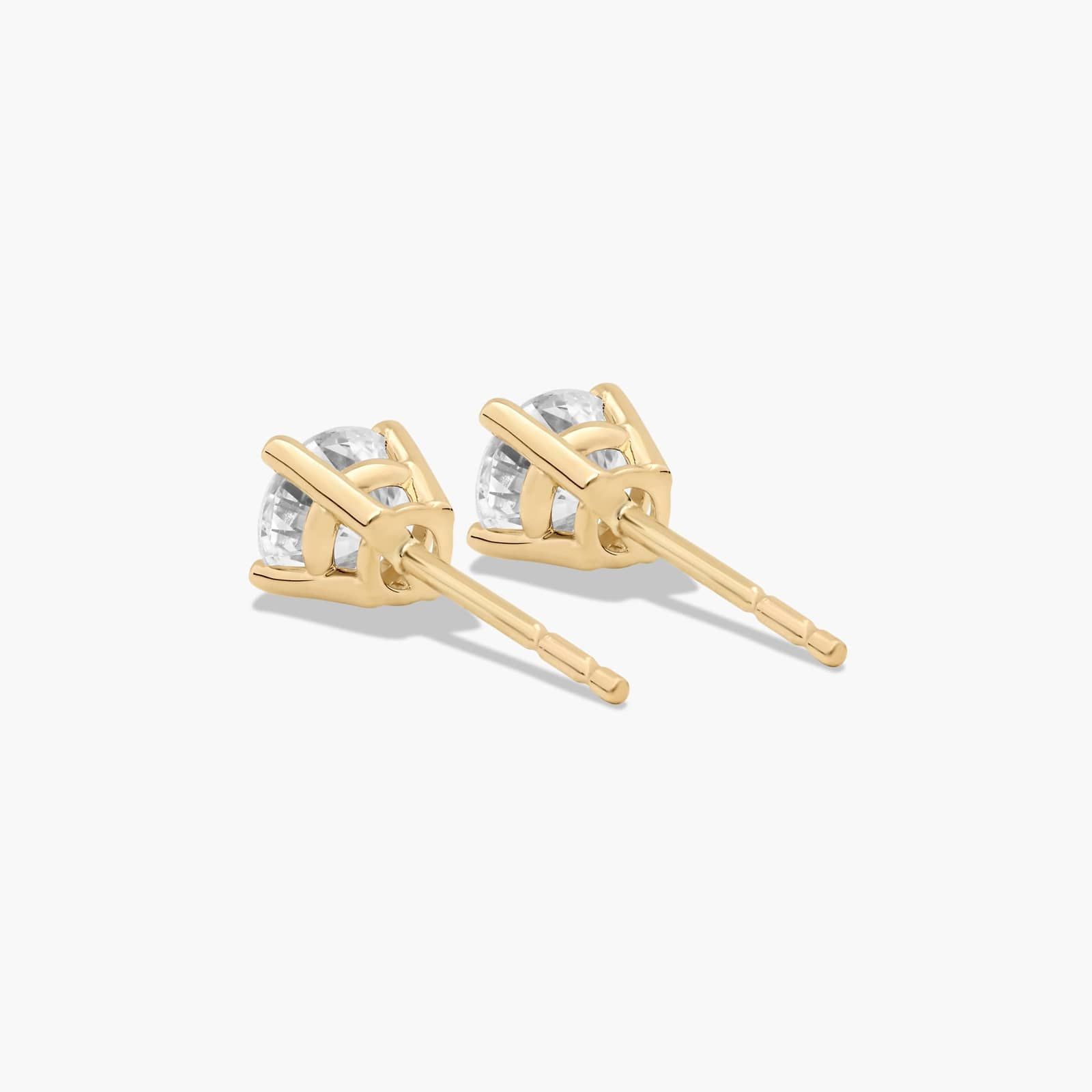 Four Prong 0.75 CTW Round Lab-Grown Diamond Stud Earrings In 14K Yellow Gold