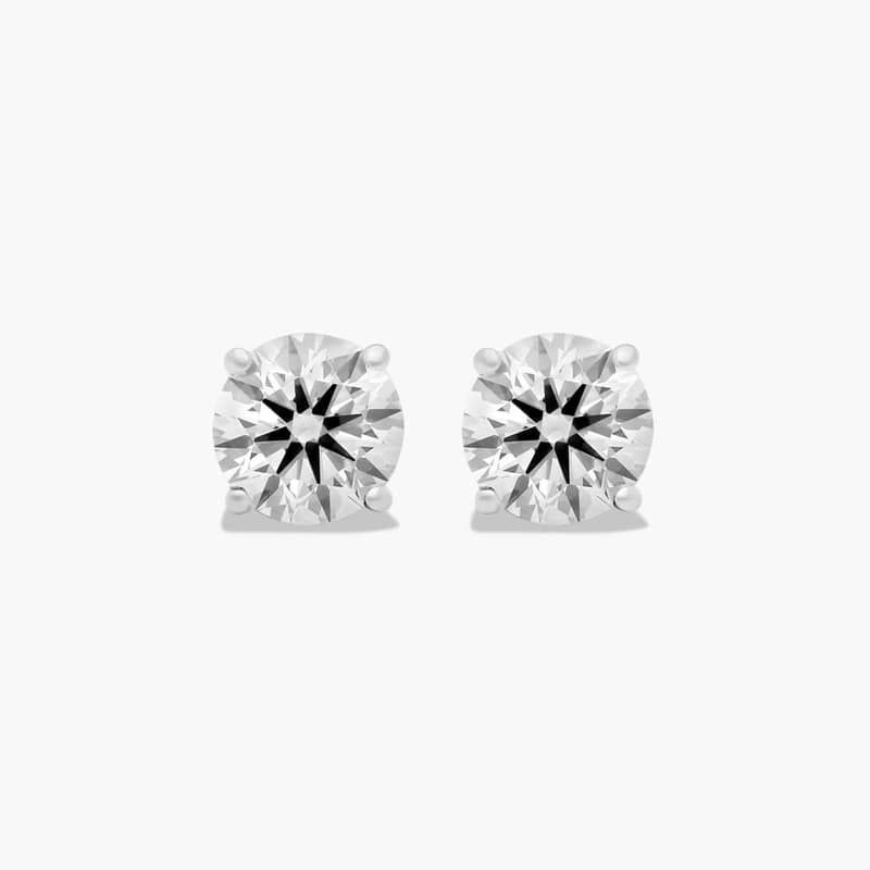 Four Prong 1.5 CTW Round Diamond Stud Earrings In Platinum