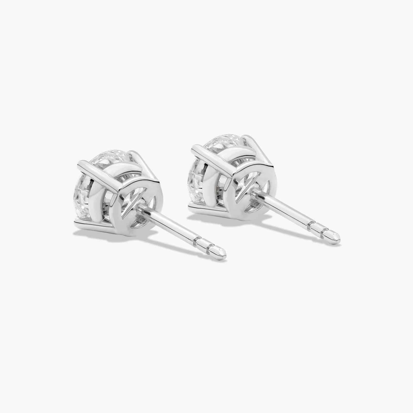 Four Prong 1.5 CTW Round Diamond Stud Earrings In Platinum
