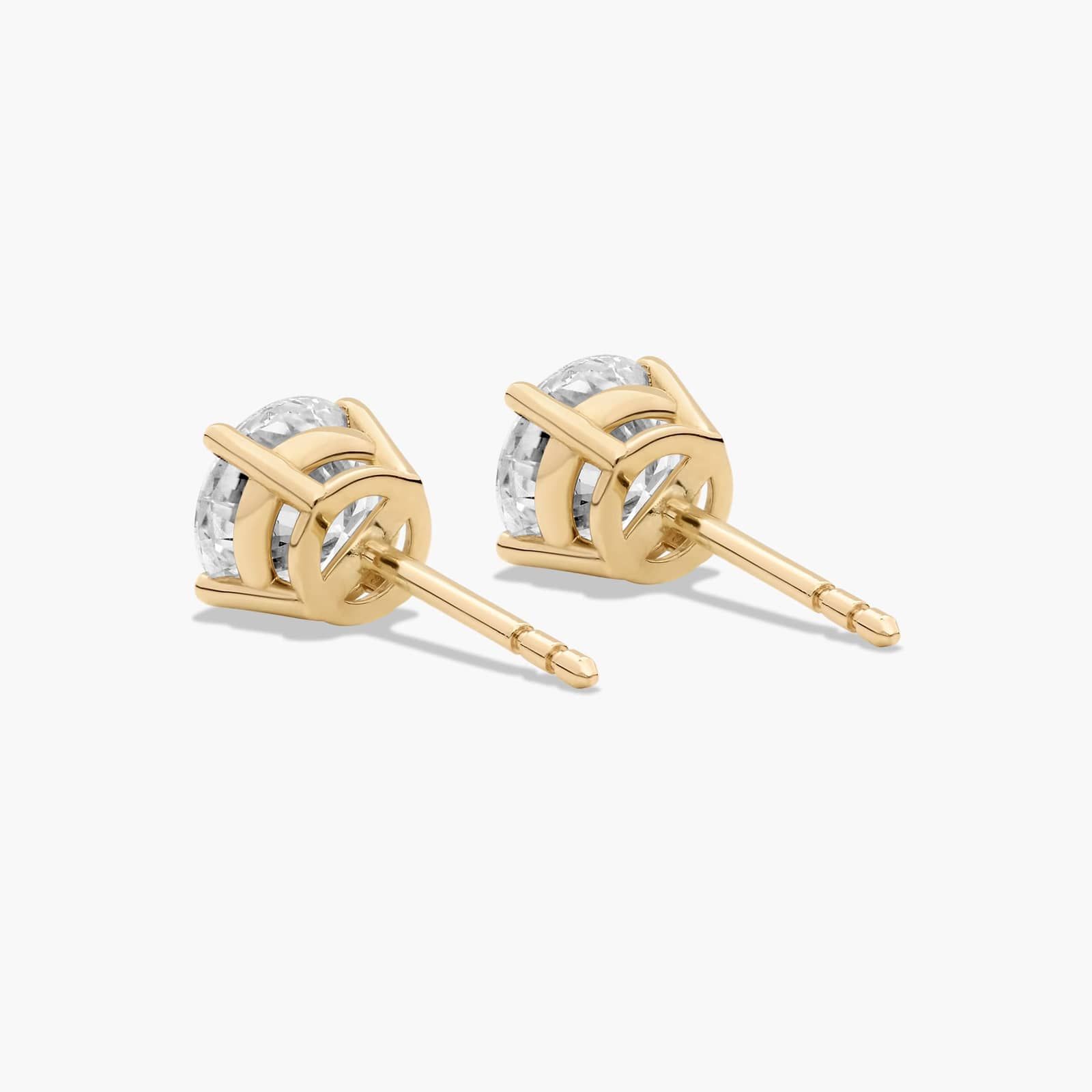 Four Prong 1.5 CTW Round Diamond Stud Earrings In 14K Yellow Gold