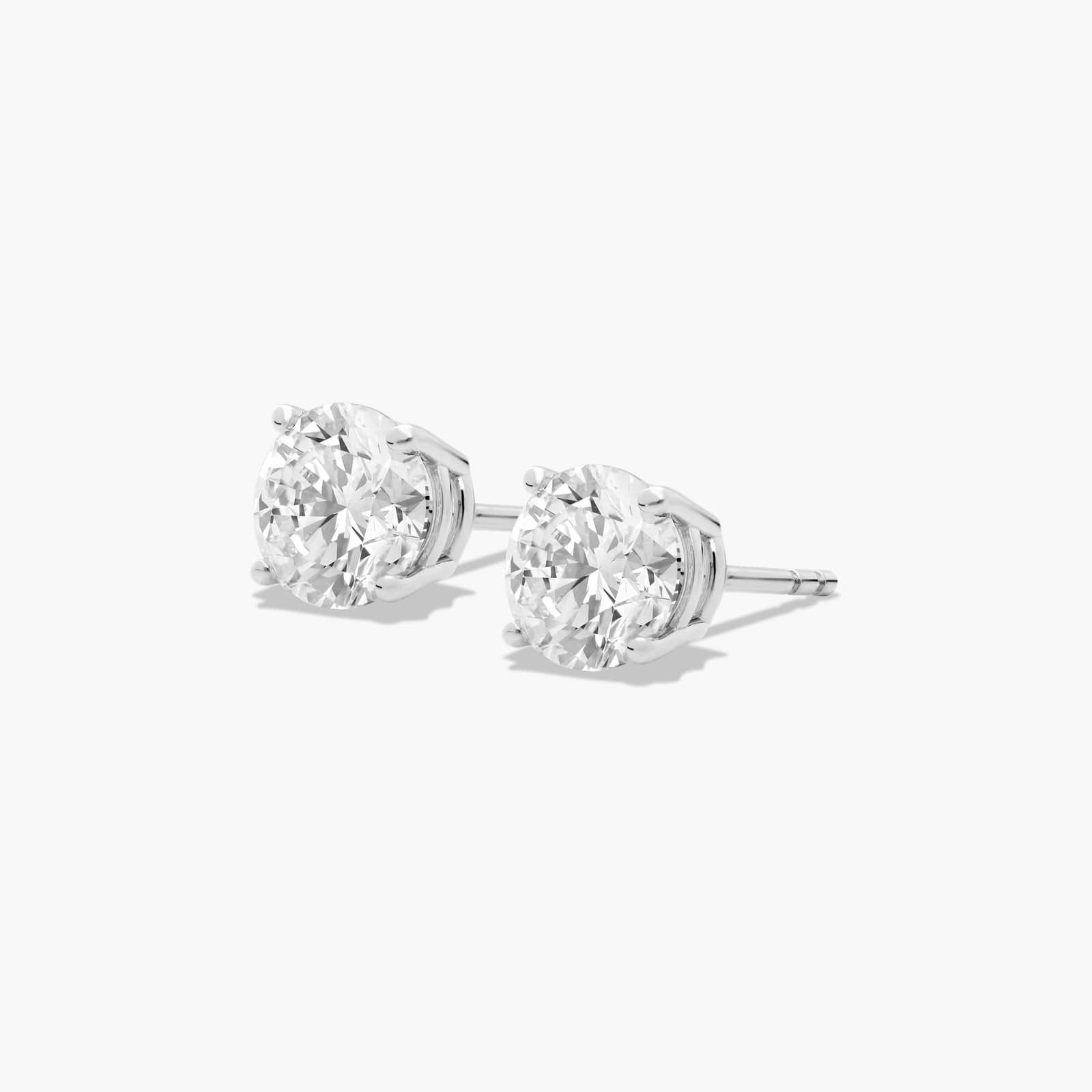 Four Prong 2 CTW Round Diamond Stud Earrings In Platinum