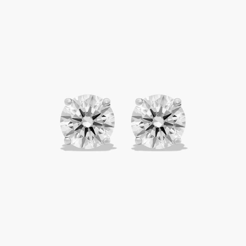 Four Prong 2.5 CTW Round Diamond Stud Earrings In Platinum